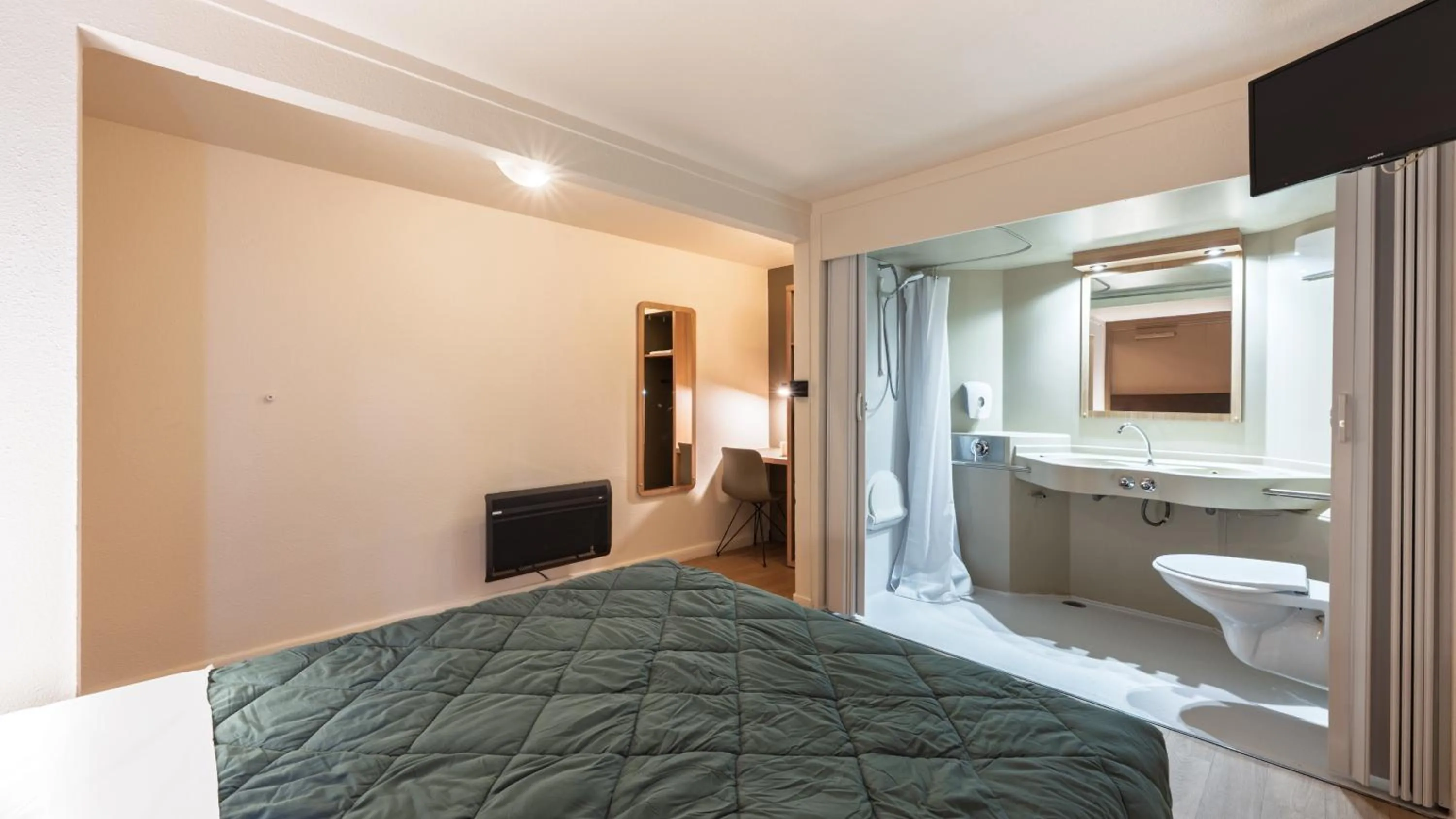 Bathroom, Bed in Premiere Classe Bourges