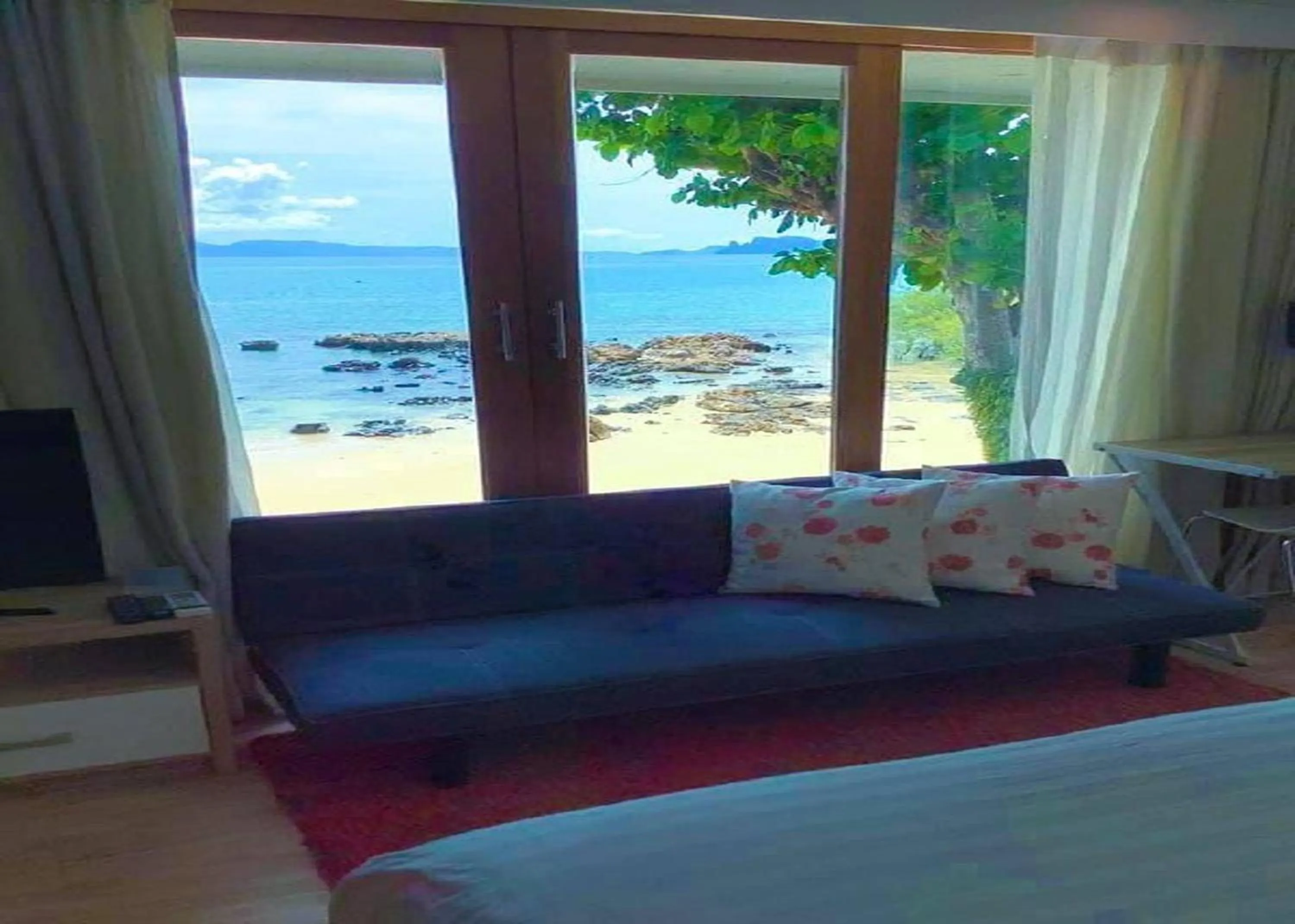 Seating area, Bed in The Parlour Krabi