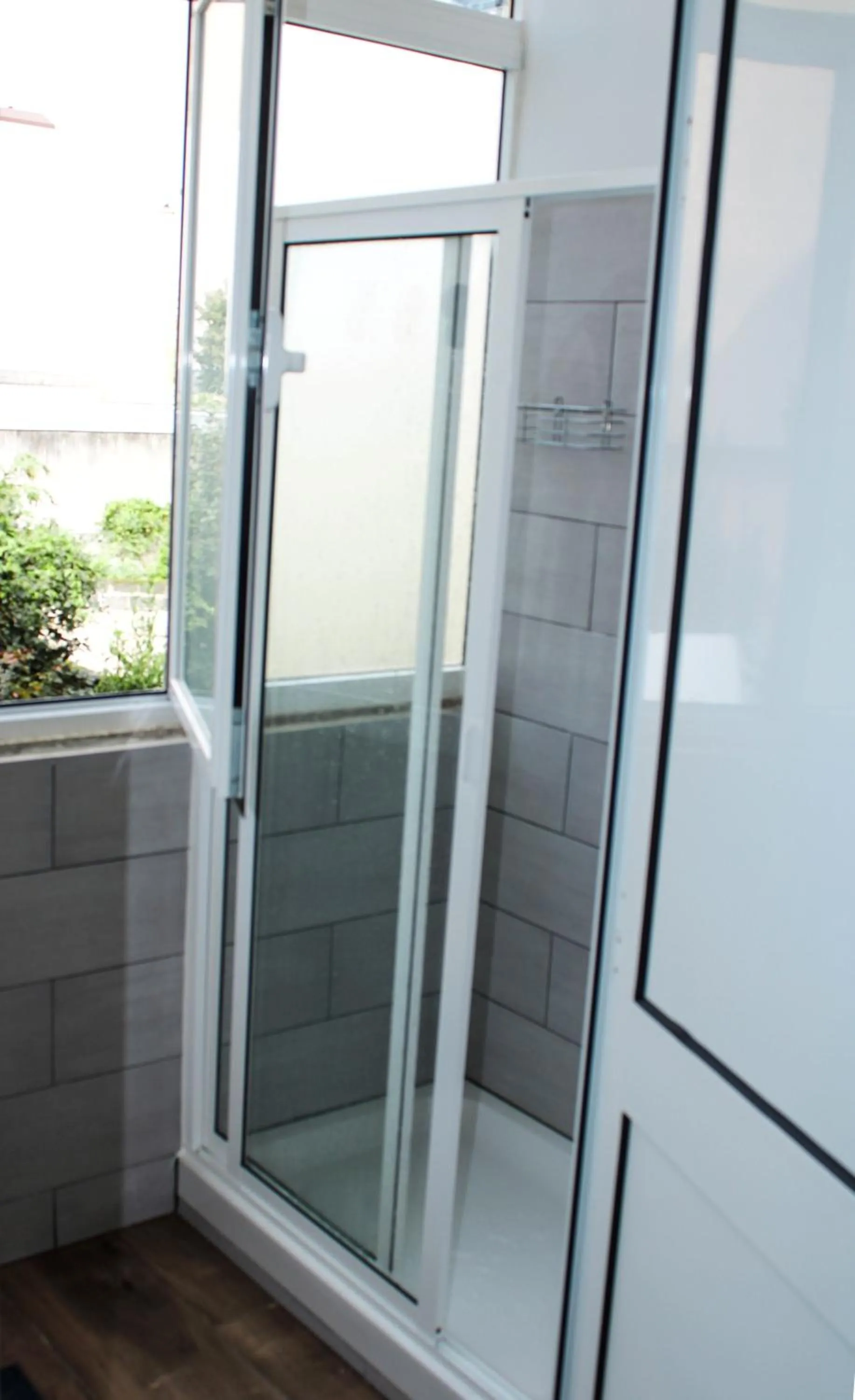 Shower in By Doors Hostel