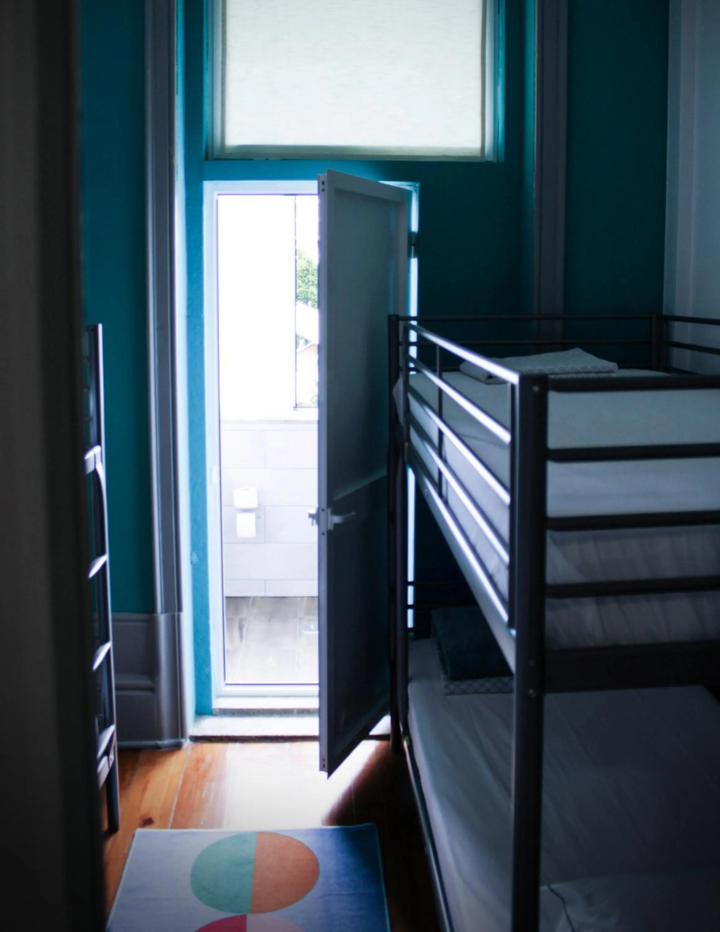 Shower, Bed in By Doors Hostel