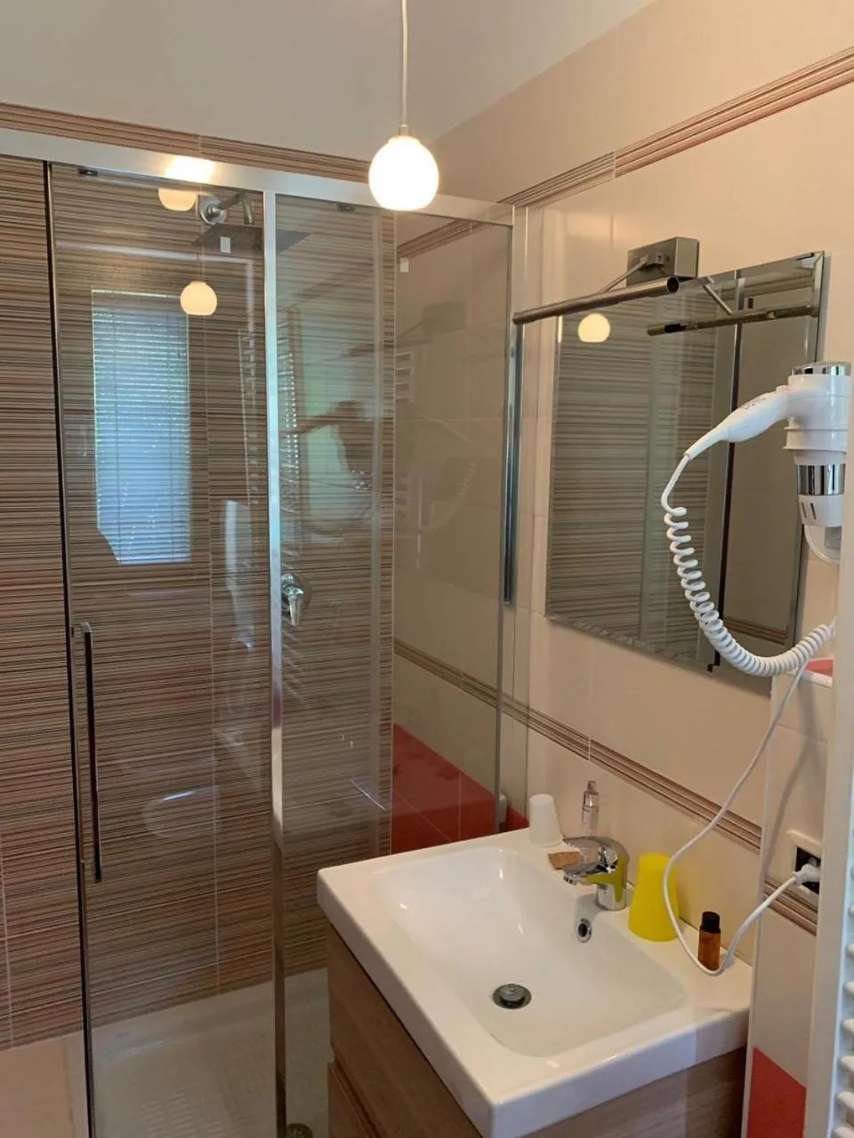 Shower in Il Ruscello Rooms and Luxury Suite