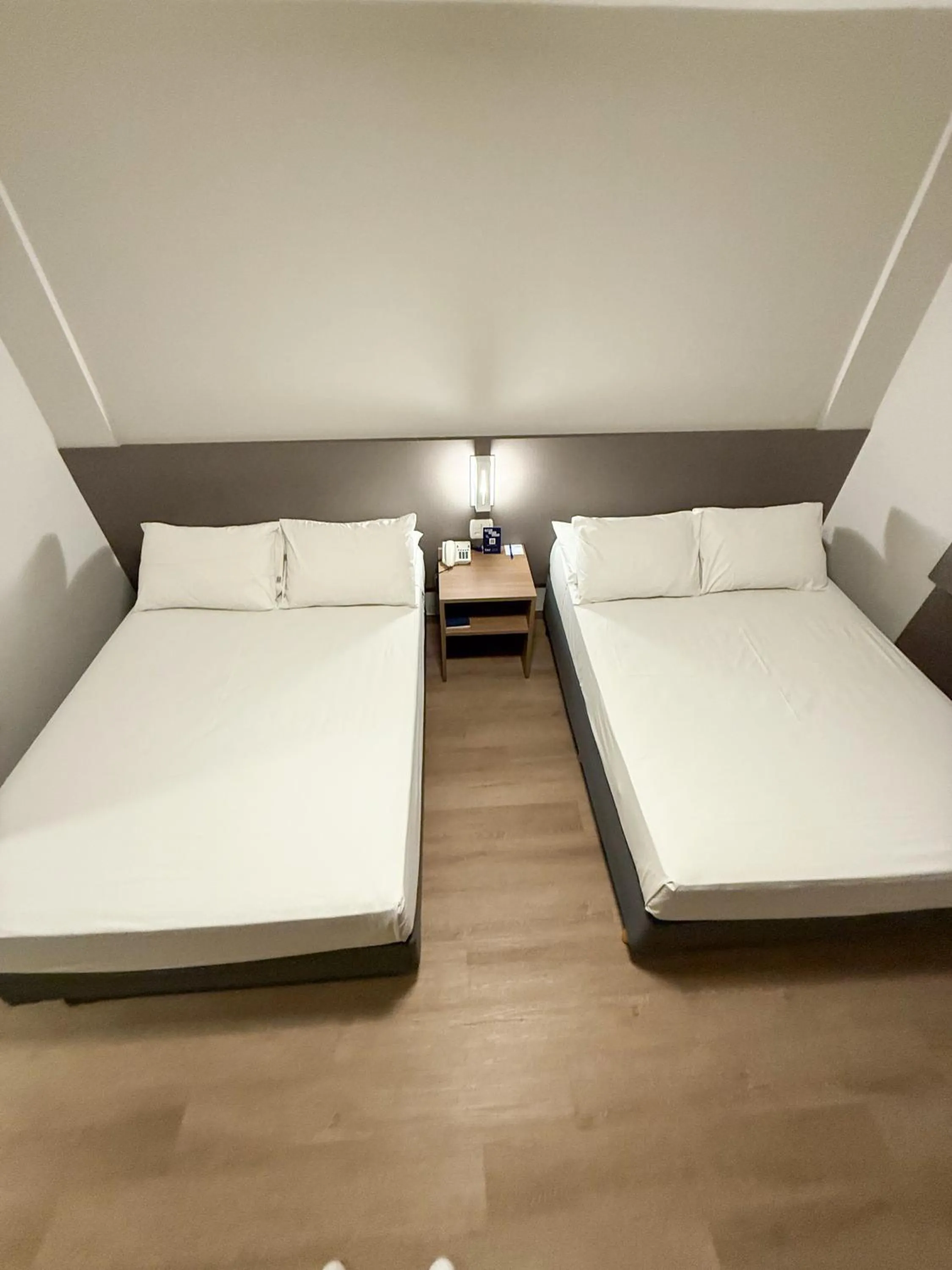 Bed in Hotel Caiuá