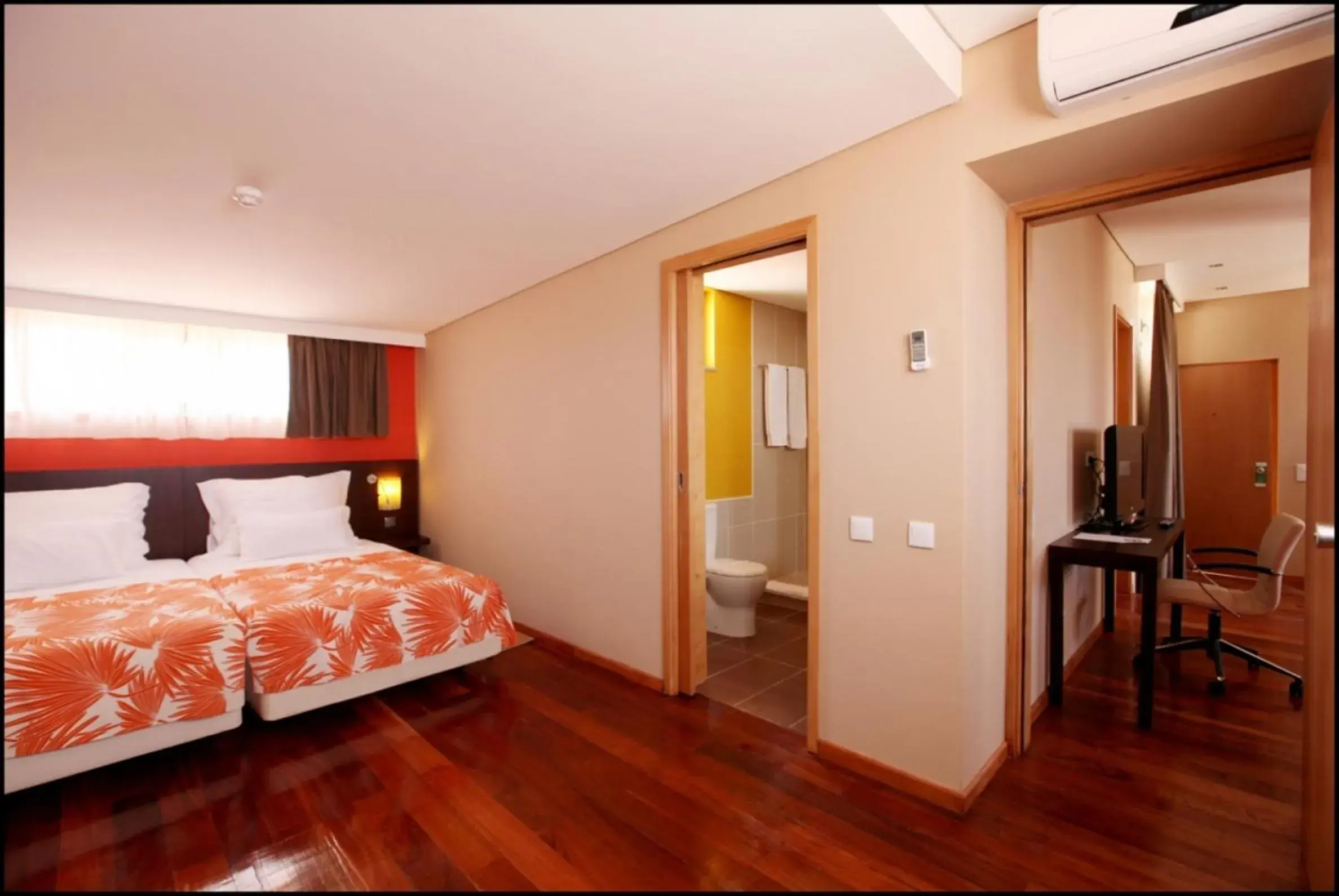 Photo of the whole room, Bed in Pestana Tropico Ocean & City Hotel Photo of the whole room, Bed in Pestana Tropico Ocean & City Hotel