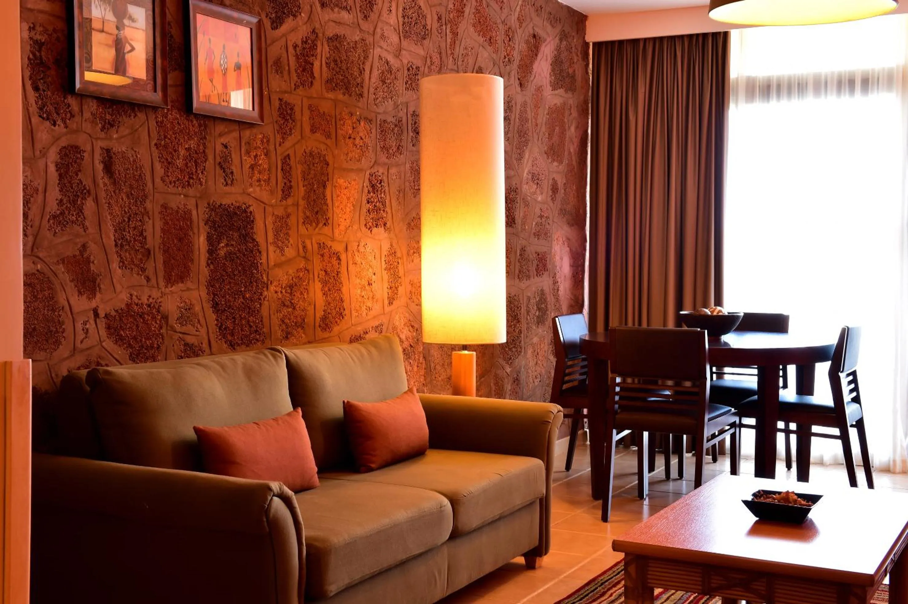 Living room in Pestana Tropico Ocean & City Hotel