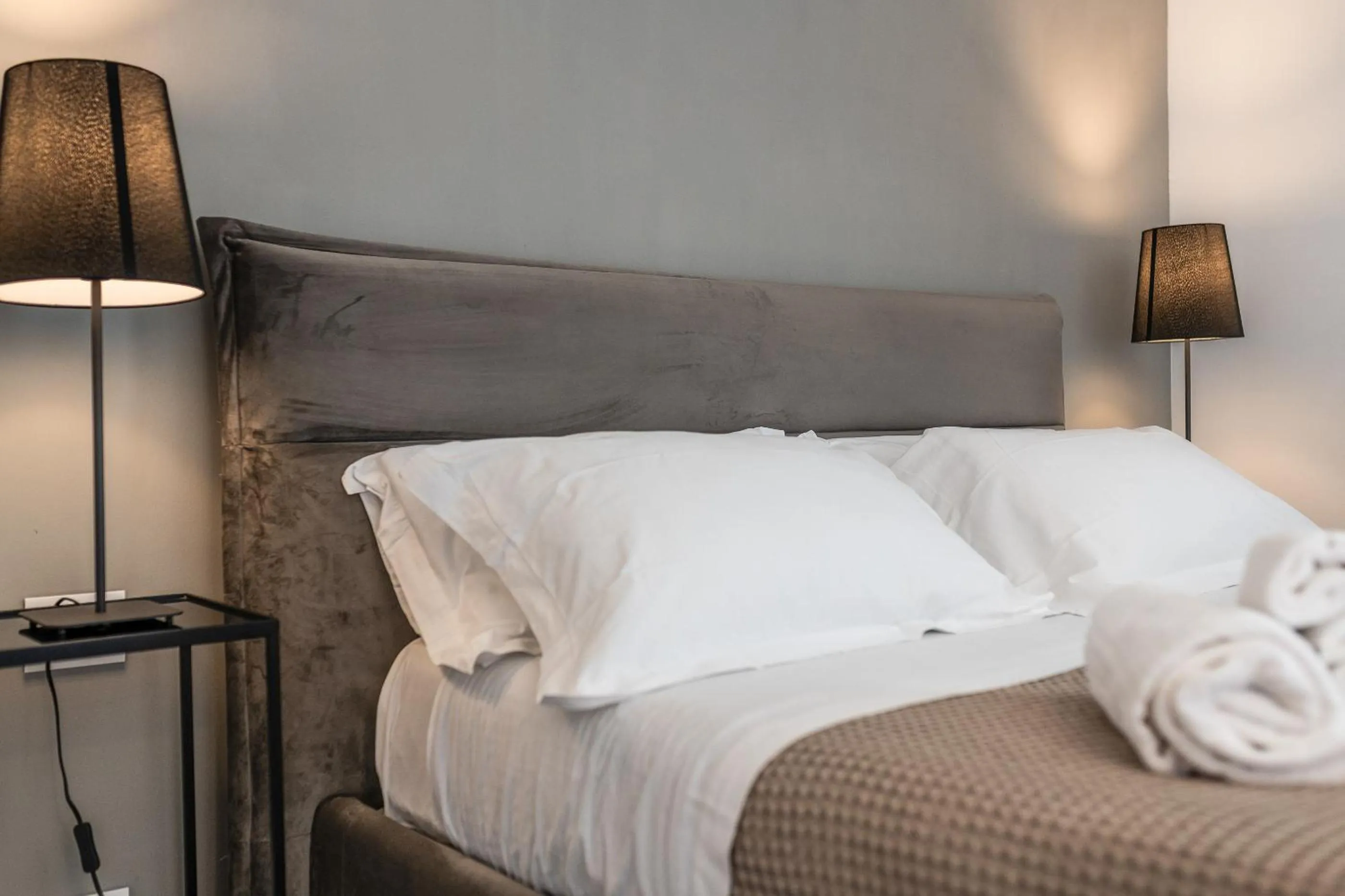 Bed in Santo Stefano Raro Rooms Collection