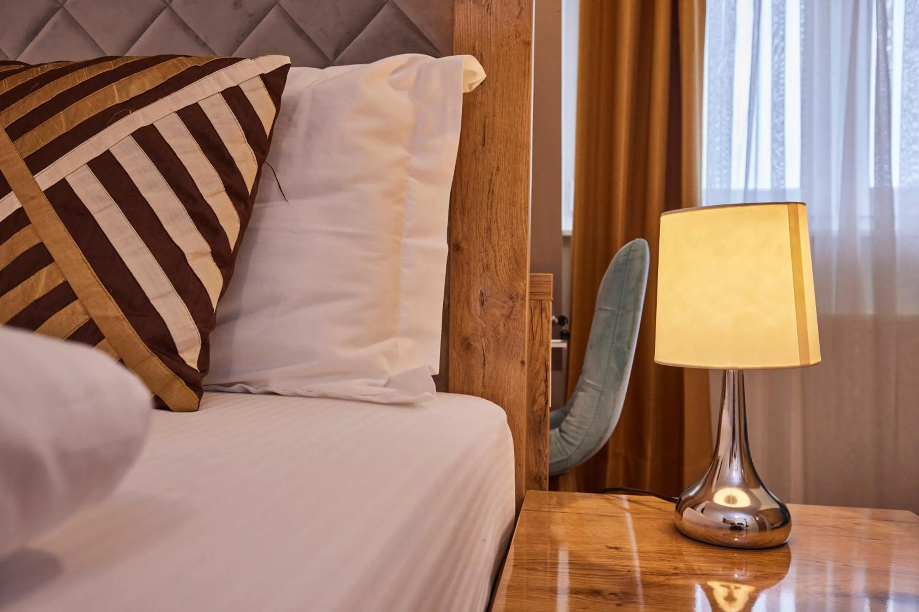 Staff, Bed in Hotel Isha