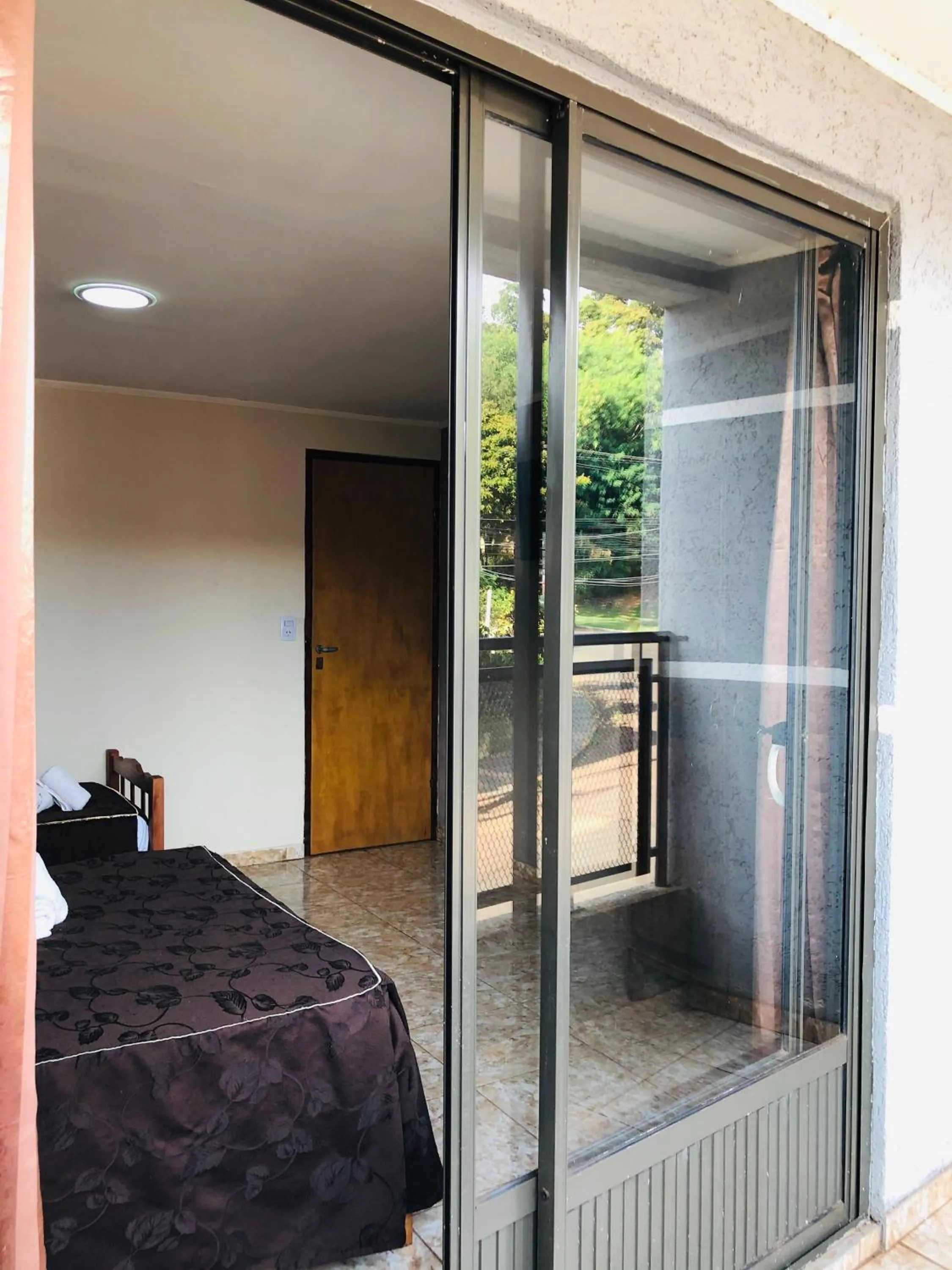 Photo of the whole room, Bed in La Familia Hotel