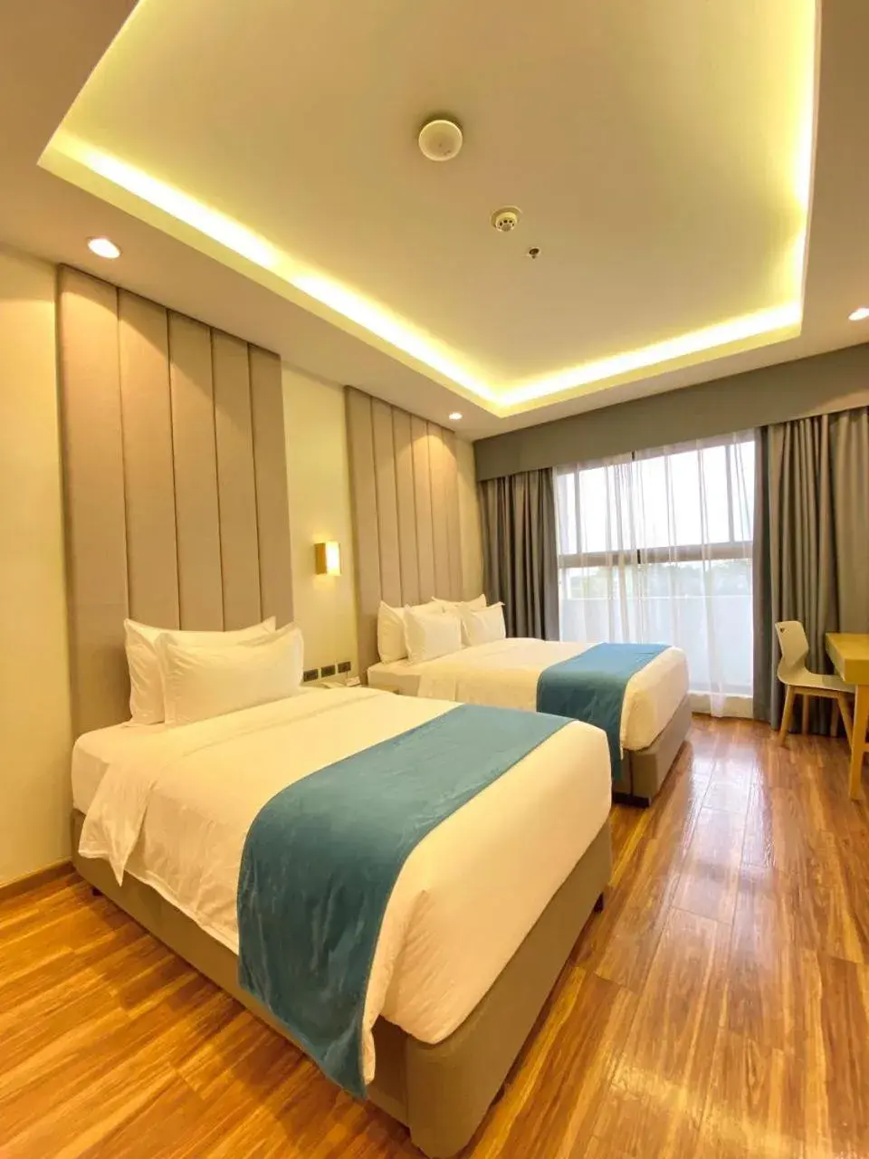 Bed in Bravo Tanauan Hotel Bed in Bravo Tanauan Hotel