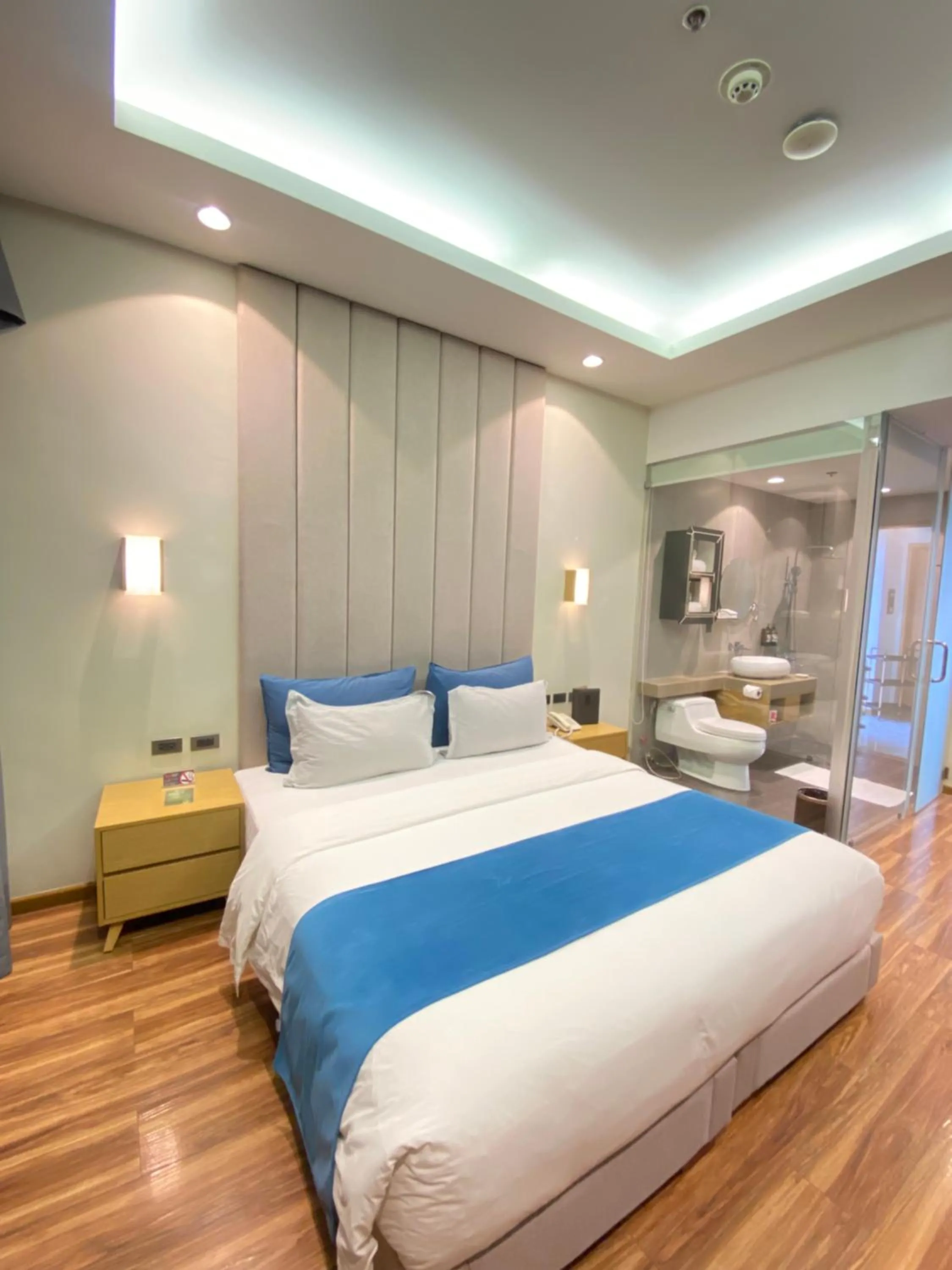 Bed in Bravo Tanauan Hotel