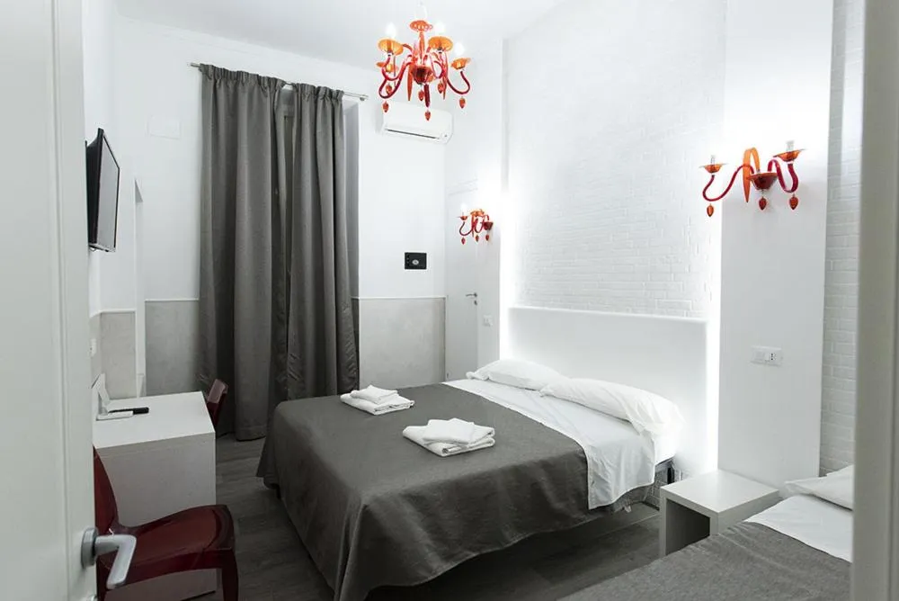 Bed in Rubino Guest House