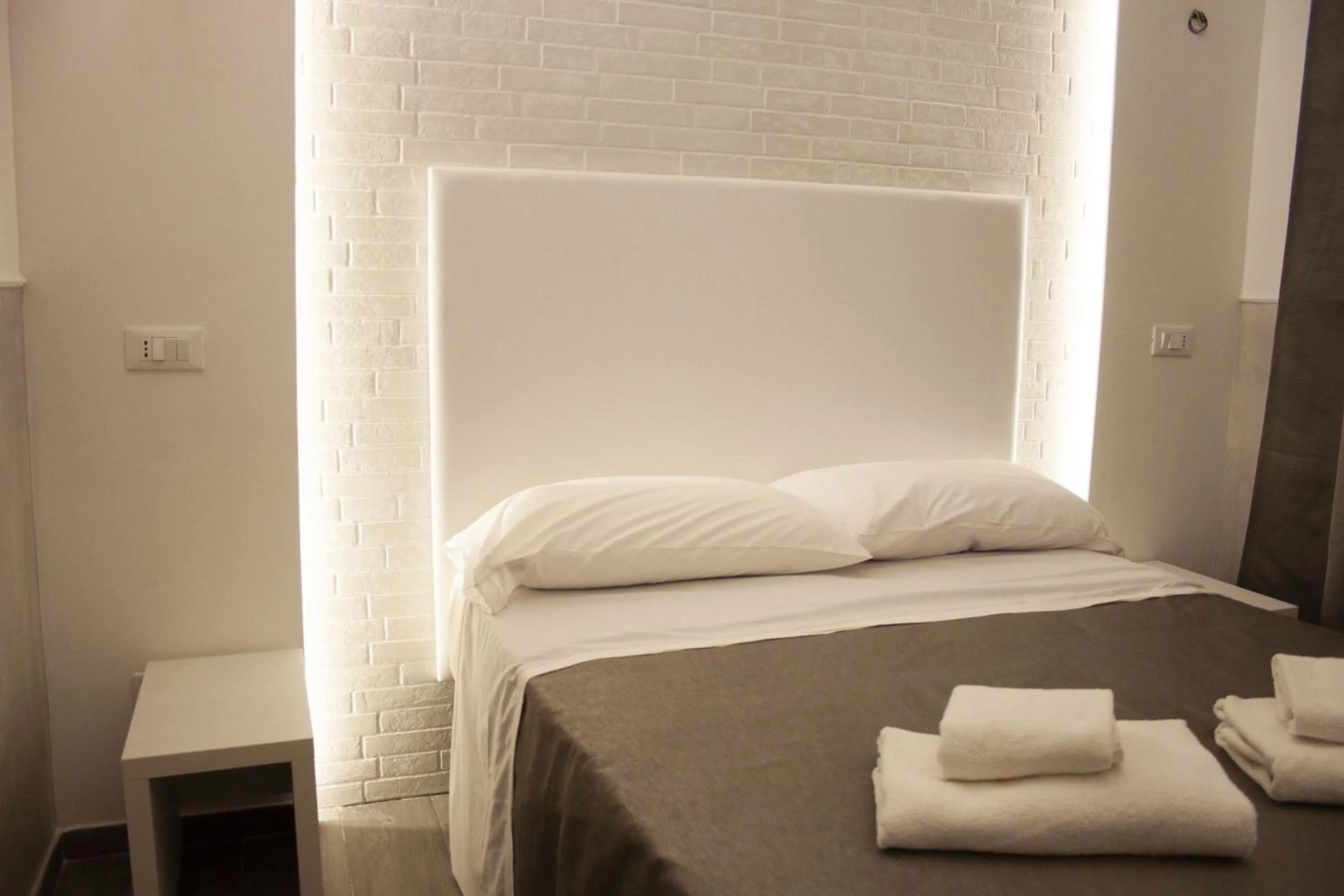 Bed in Rubino Guest House