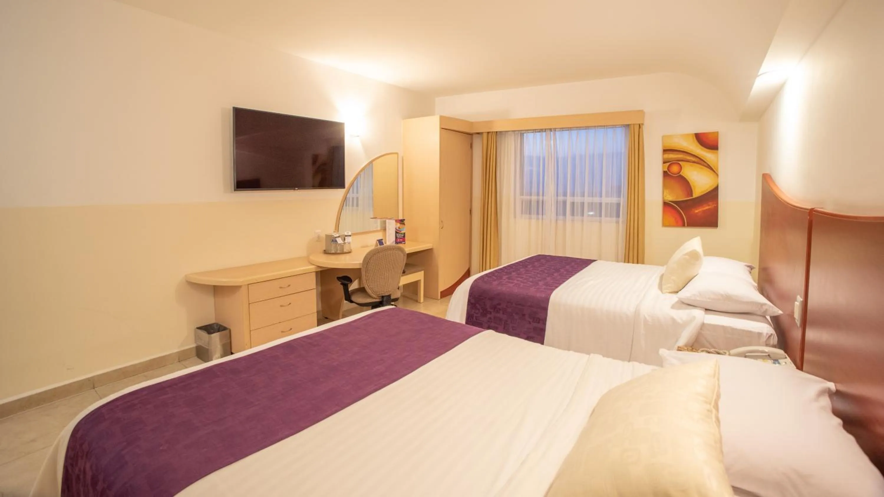 Bed in Hotel Magico Inn