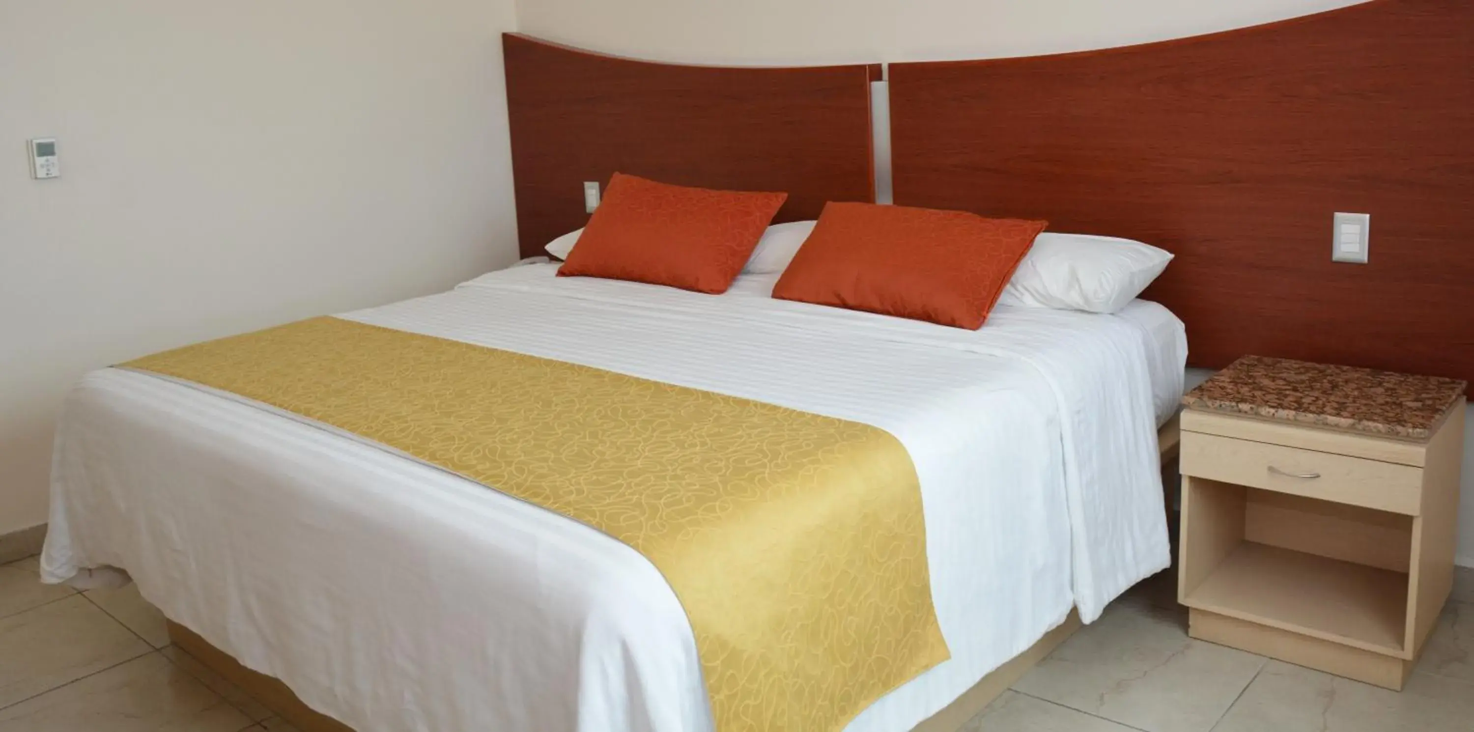 Bed in Hotel Magico Inn Bed in Hotel Magico Inn