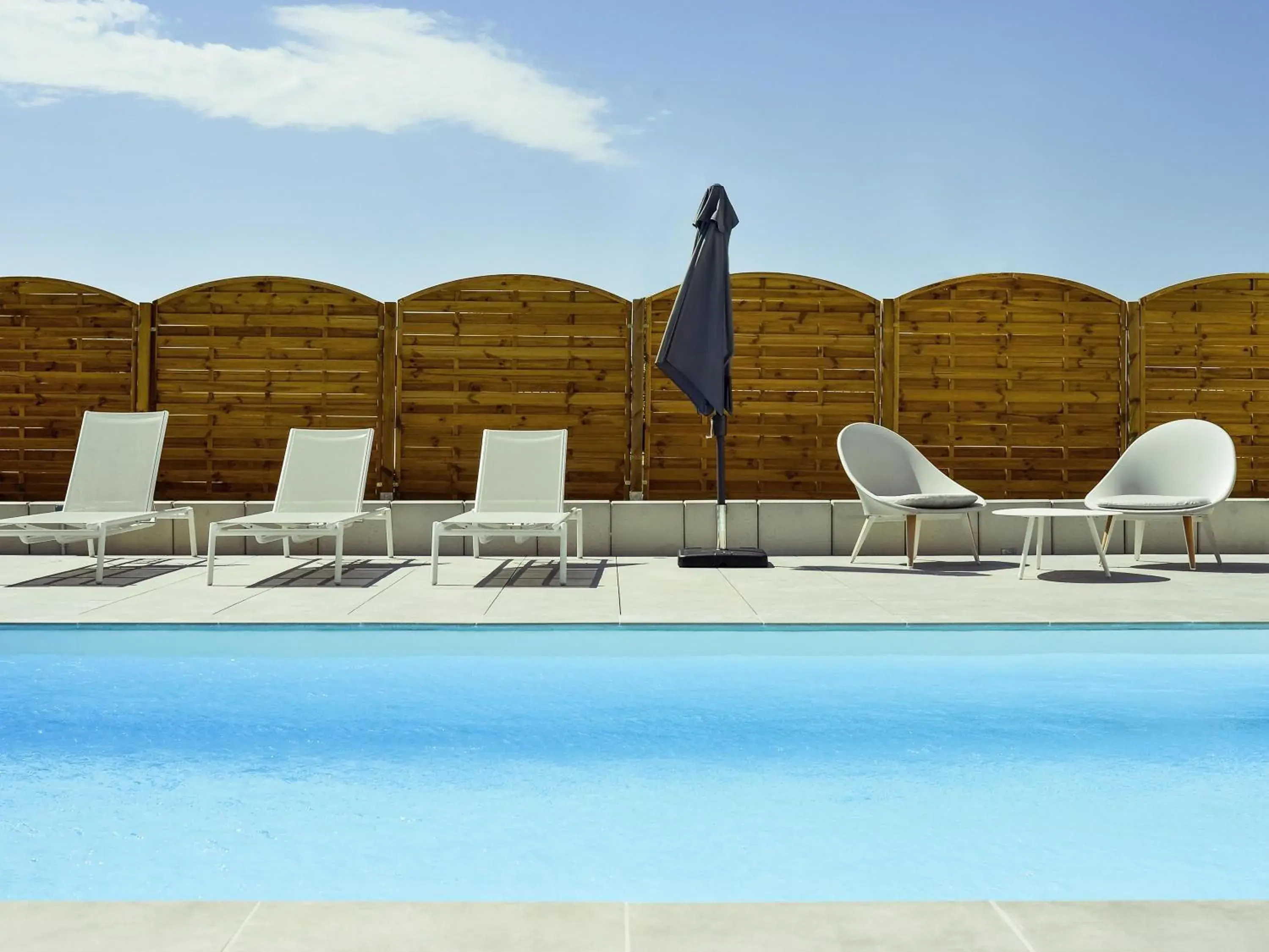 Pool view in Mercure Lyon Genas Eurexpo Pool view in Mercure Lyon Genas Eurexpo