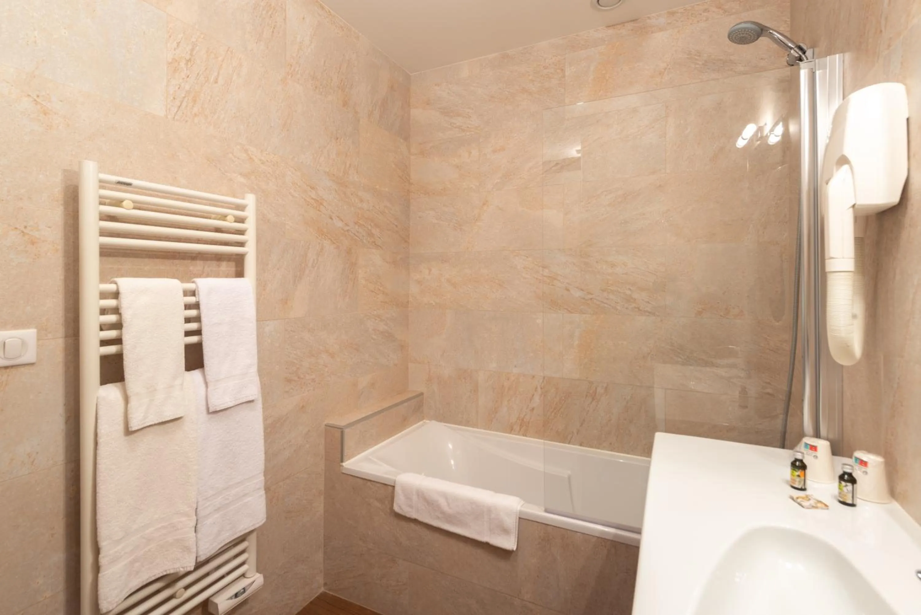 Bathroom in Logis Hotel de La Cloche