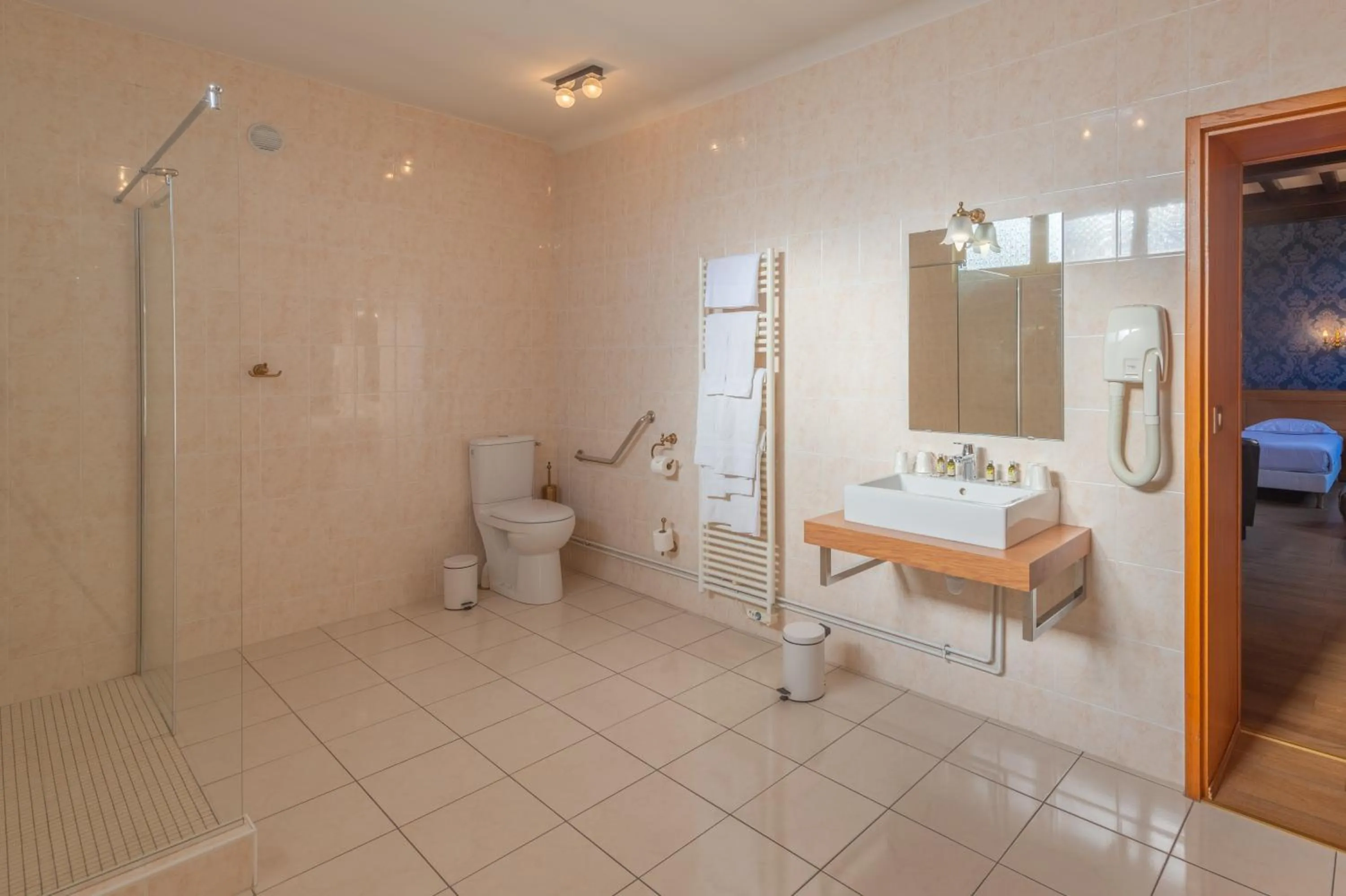 Bathroom in Logis Hotel de La Cloche