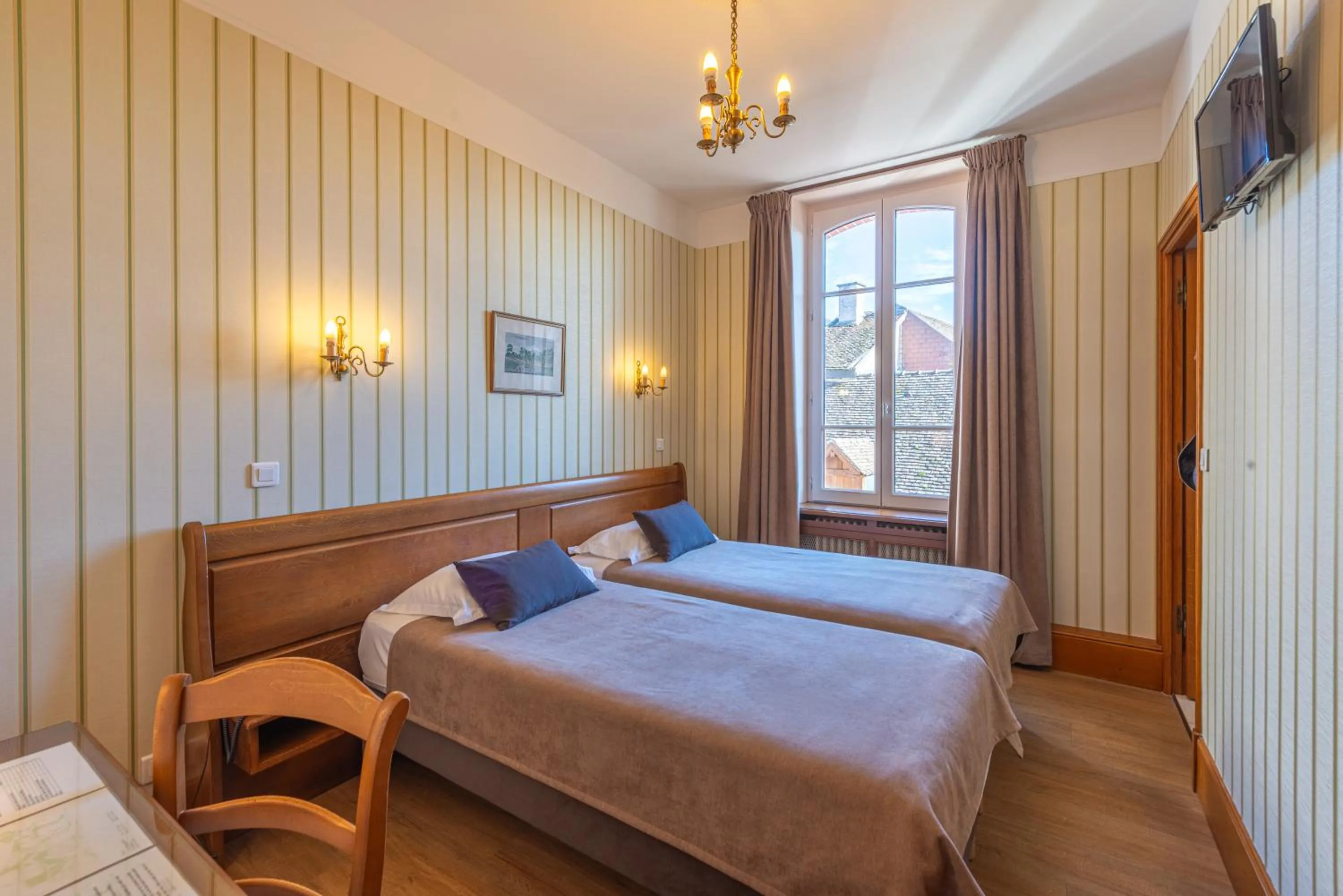 Photo of the whole room, Bed in Logis Hotel de La Cloche