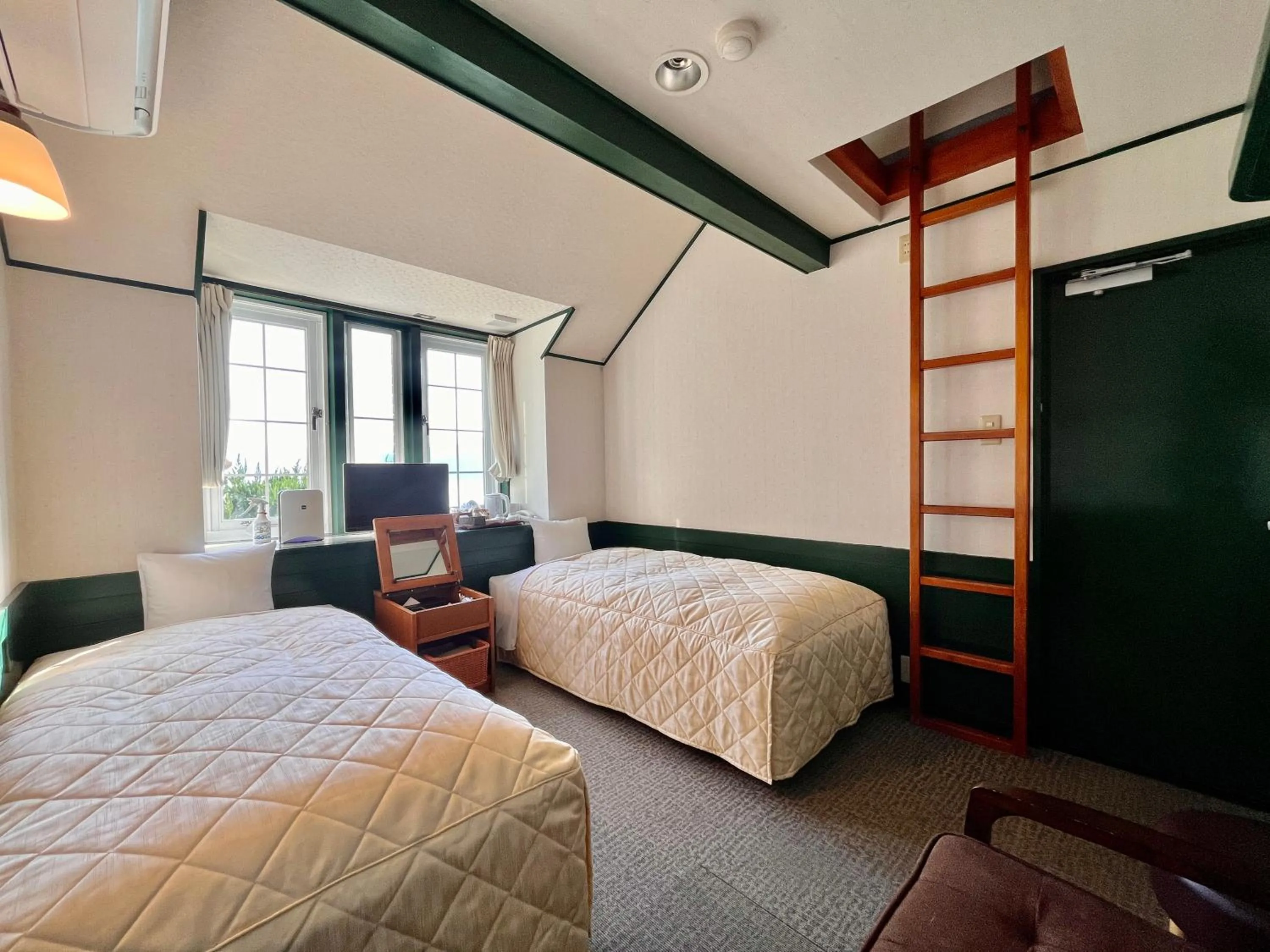 Bed in Hotel Cocorone Lodge and Spa