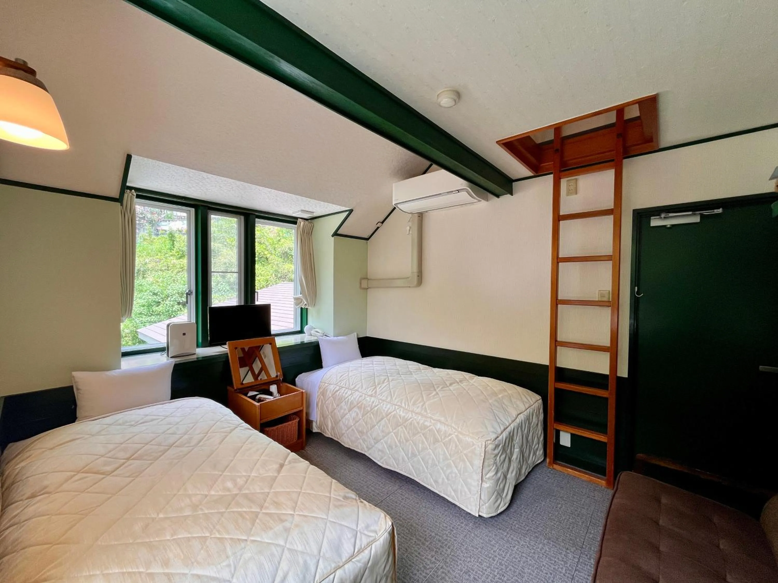 Bed in Hotel Cocorone Lodge and Spa