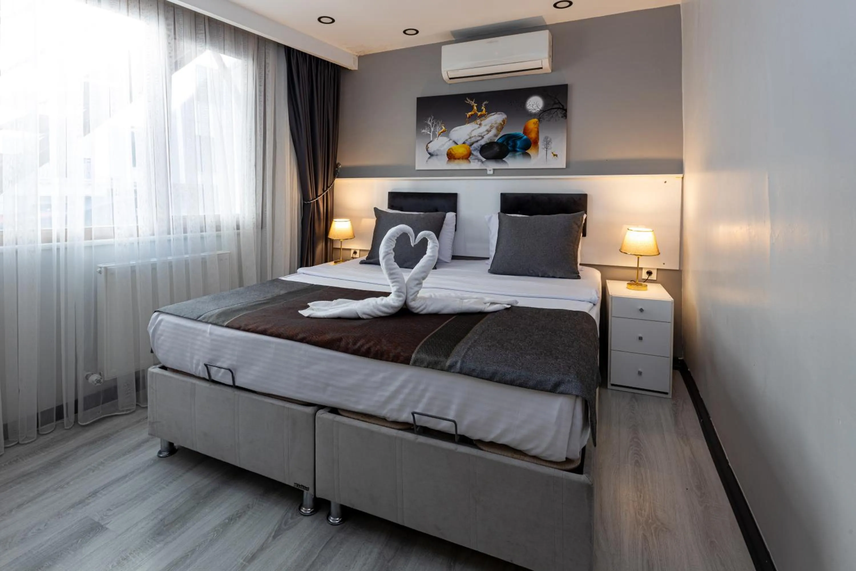 Bed in APOLLO HOTEL & APARTMENtS