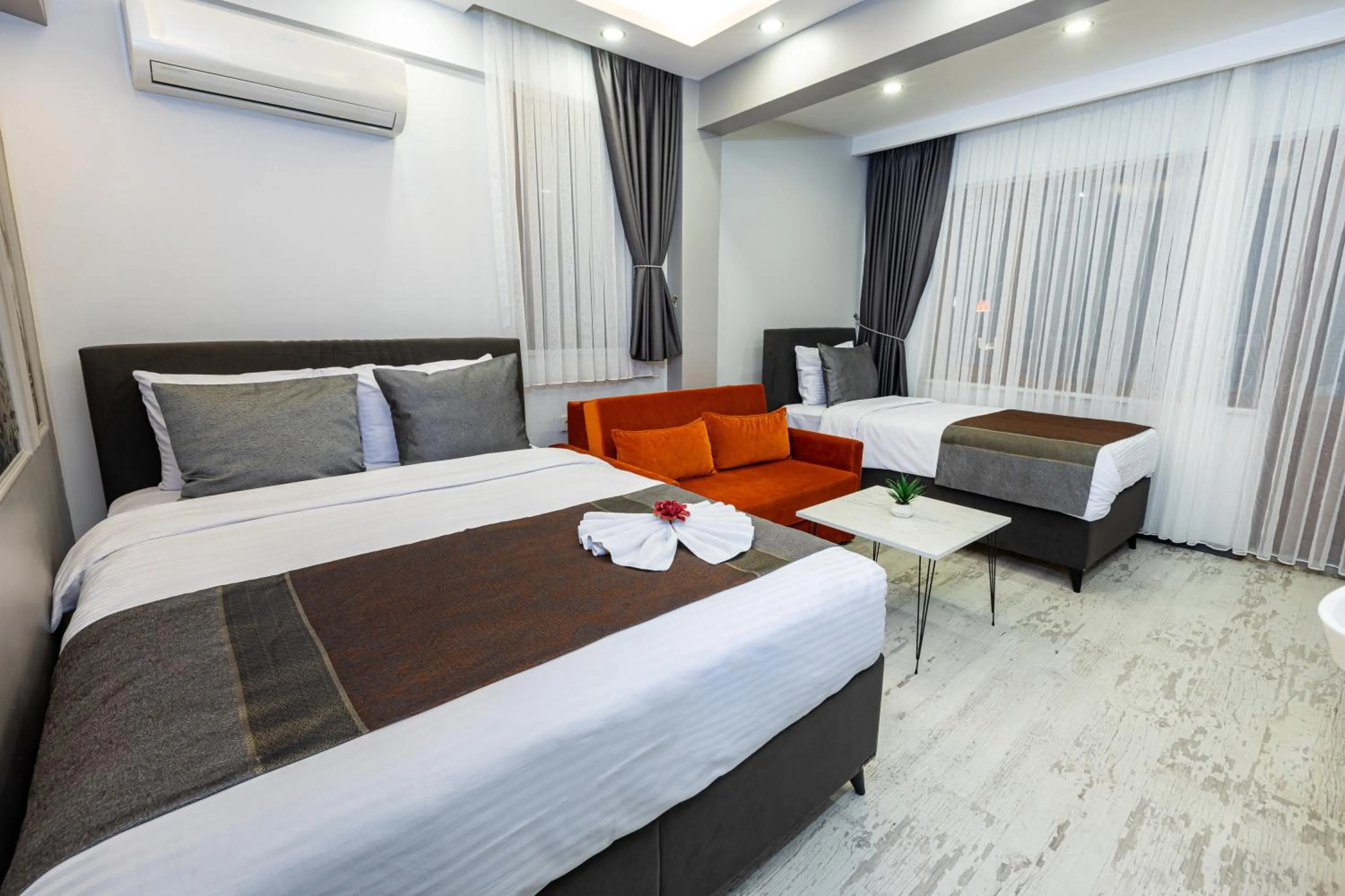 Bed in APOLLO HOTEL & APARTMENtS