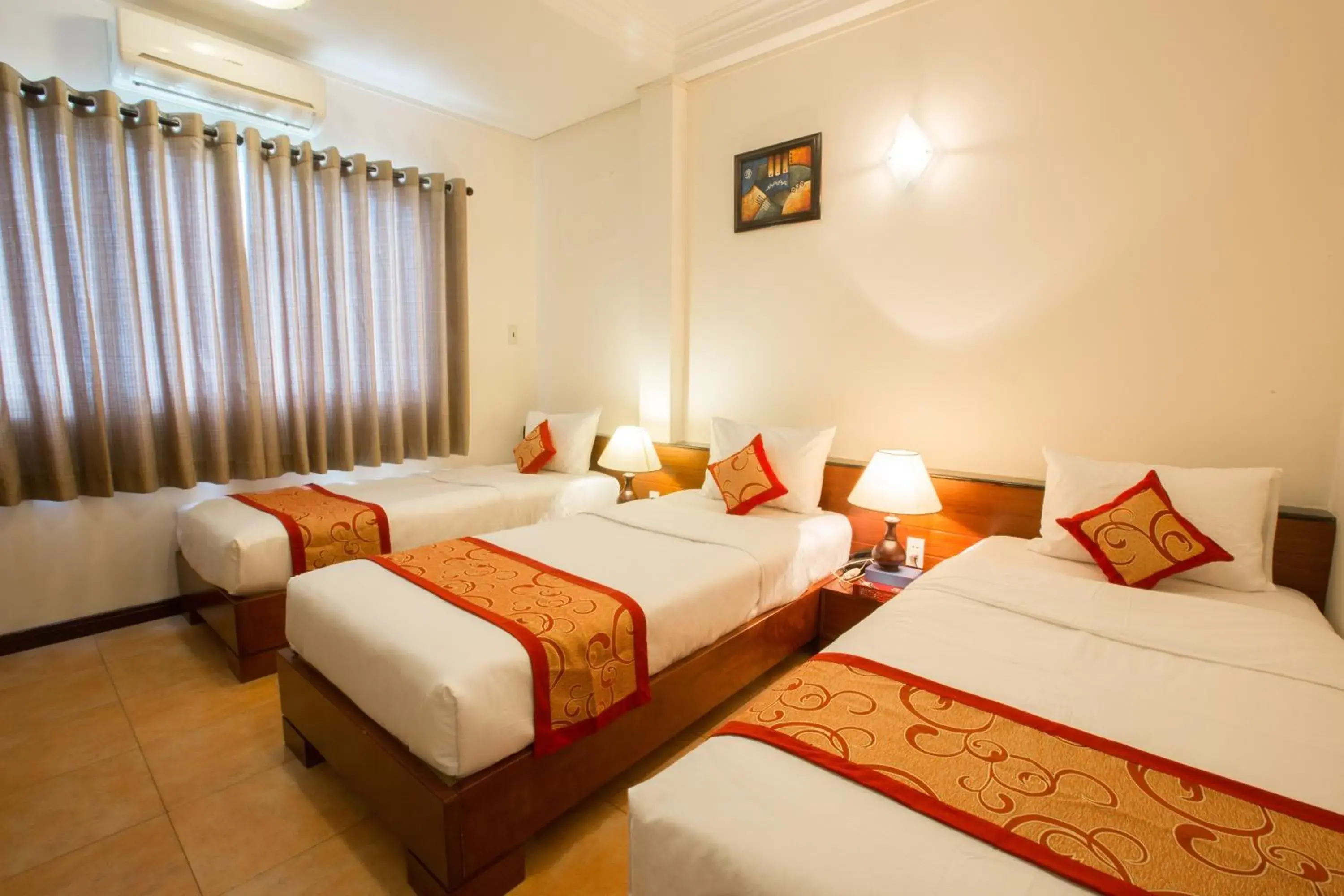 Deluxe Triple Room in Ngoc Minh Hotel Deluxe Triple Room in Ngoc Minh Hotel