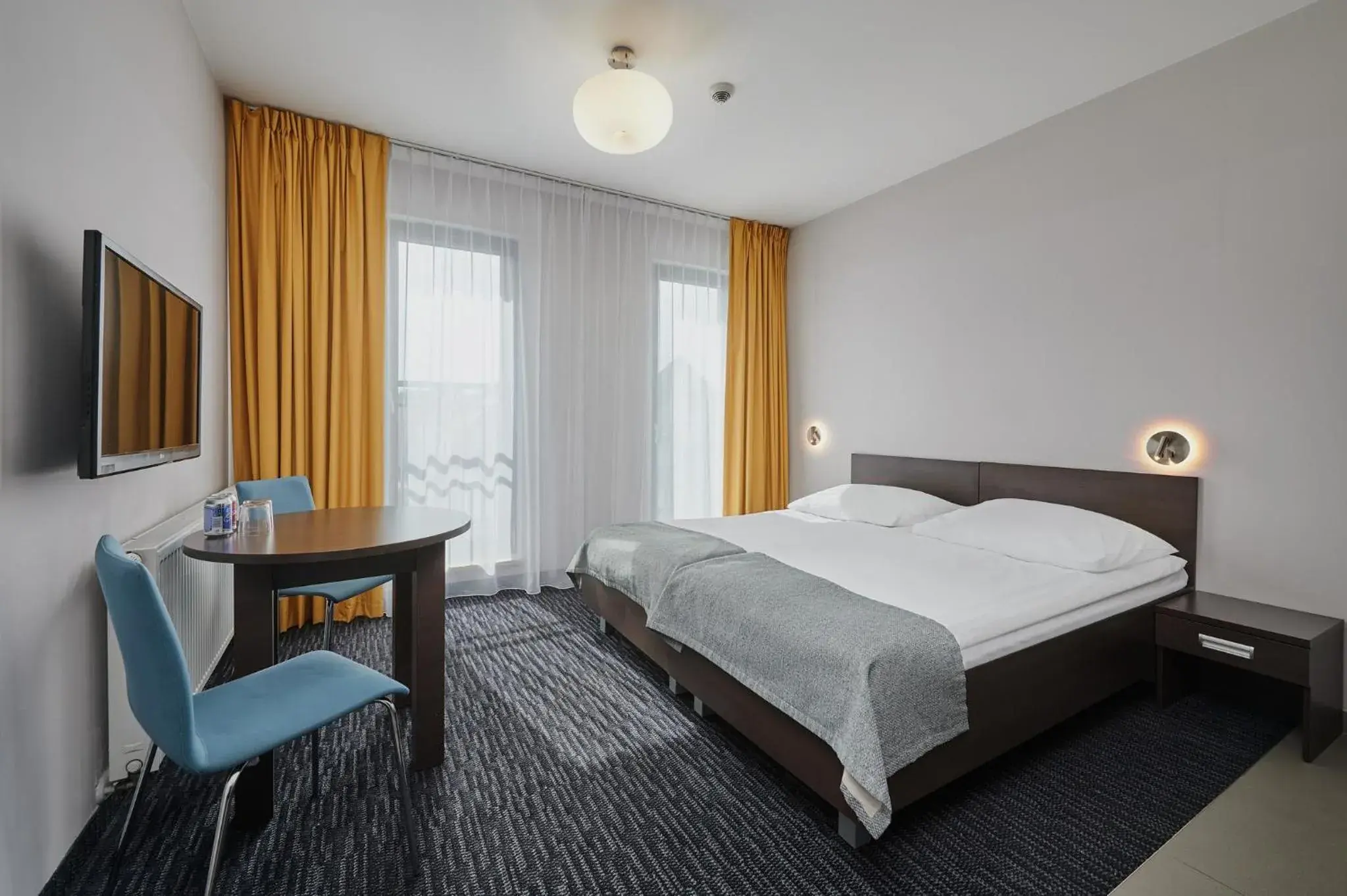 Living room, Bed in Golden Tulip Gdańsk Residence Living room, Bed in Golden Tulip Gdańsk Residence