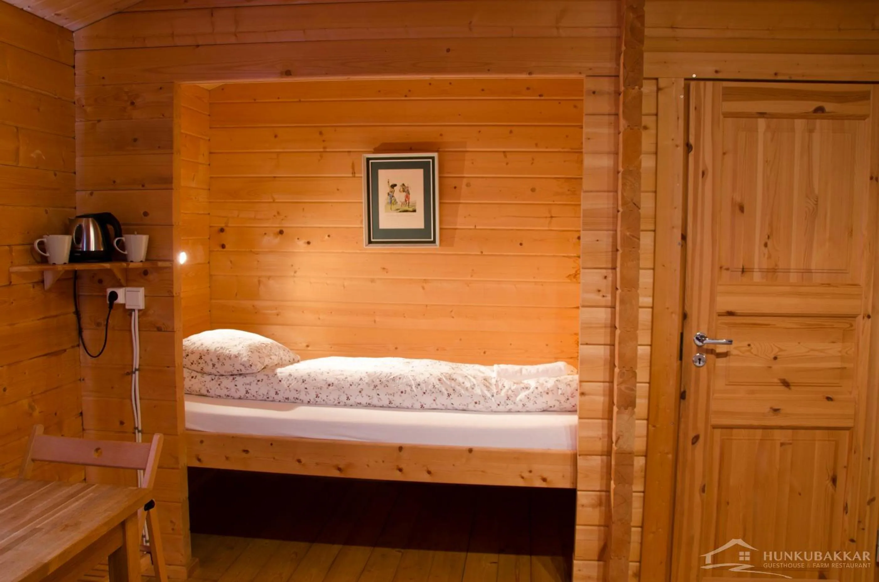 Bed in Hunkubakkar Guesthouse