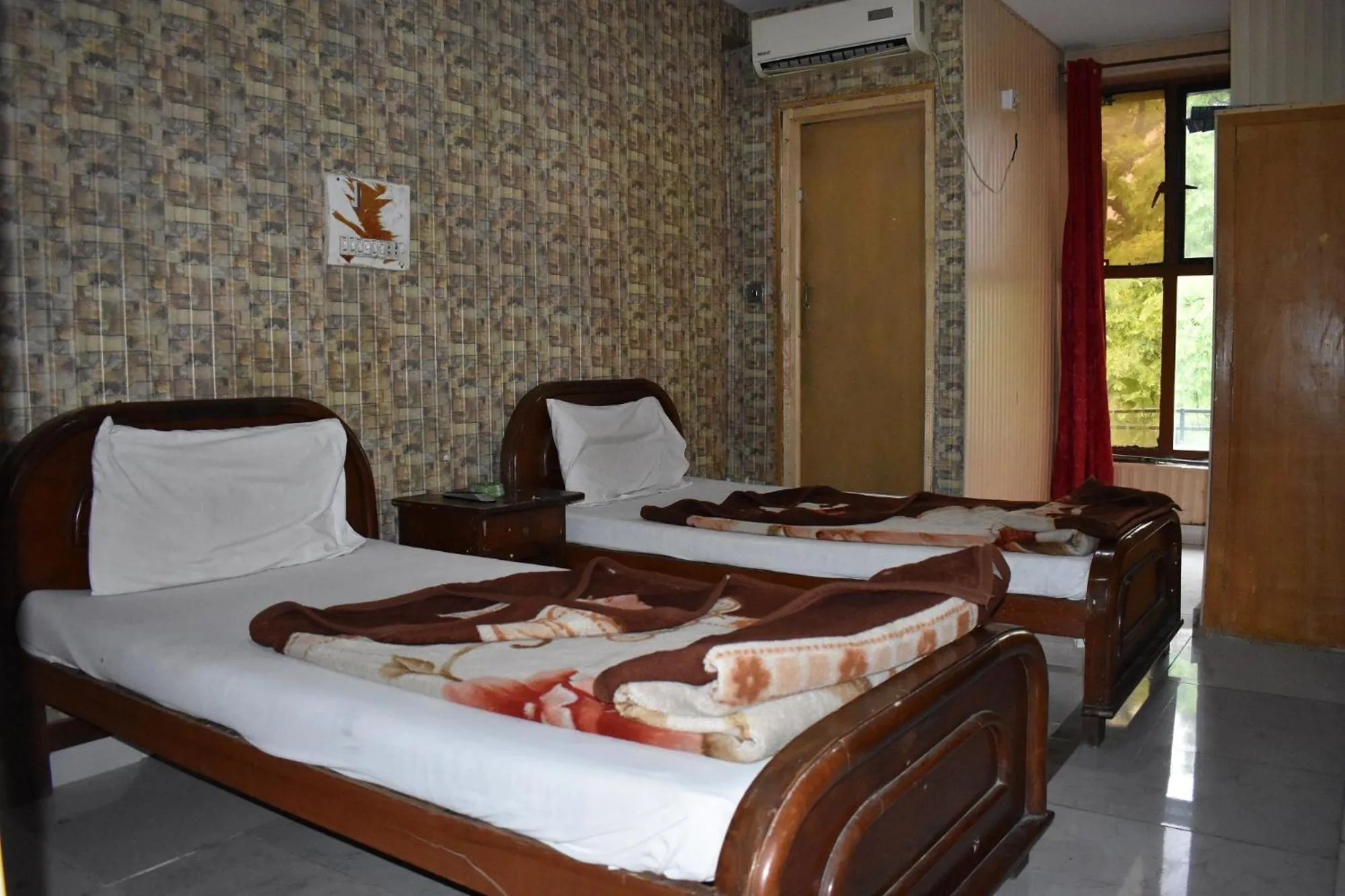 Bed in Sitara Hotel