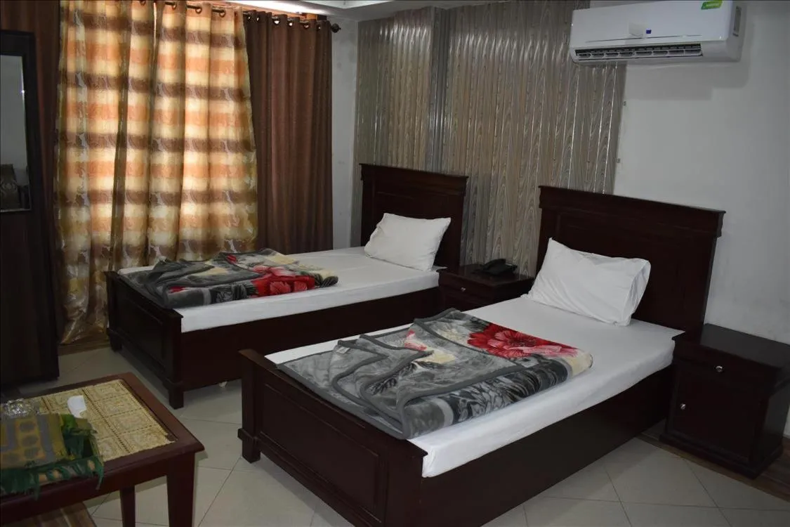 Photo of the whole room, Bed in Hotel Kashmir Inn