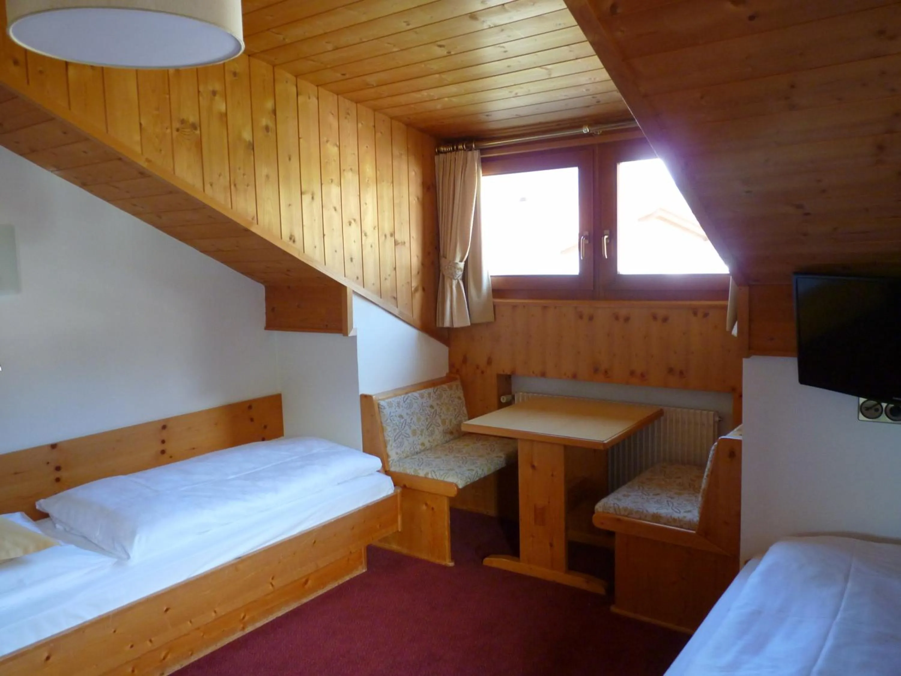 Bed in Hotel Fortuna