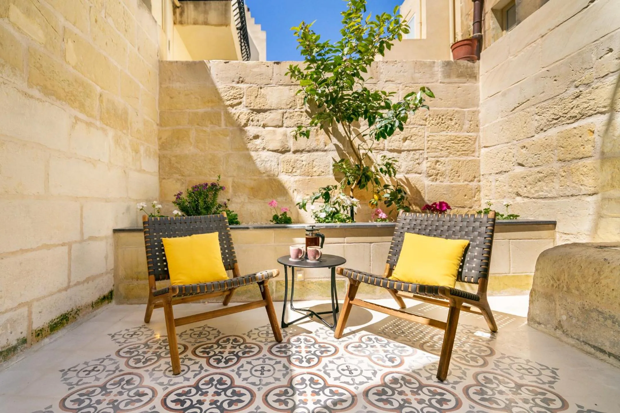 Patio in Amazing Art Deco Villa 150m to sea with Daily Housekeeping