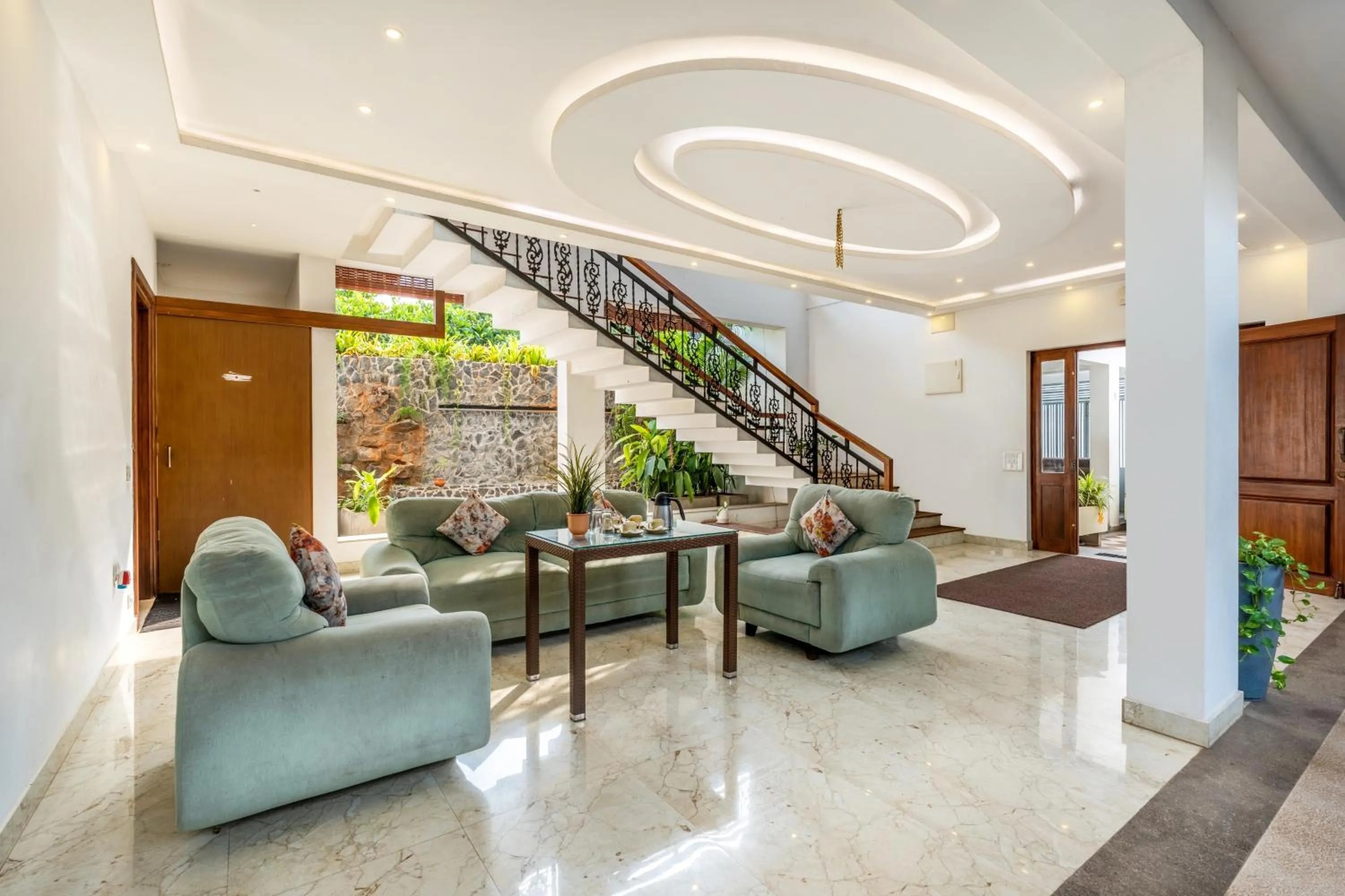 Seating area in Treebo Premium Villa Escape In With Pool View