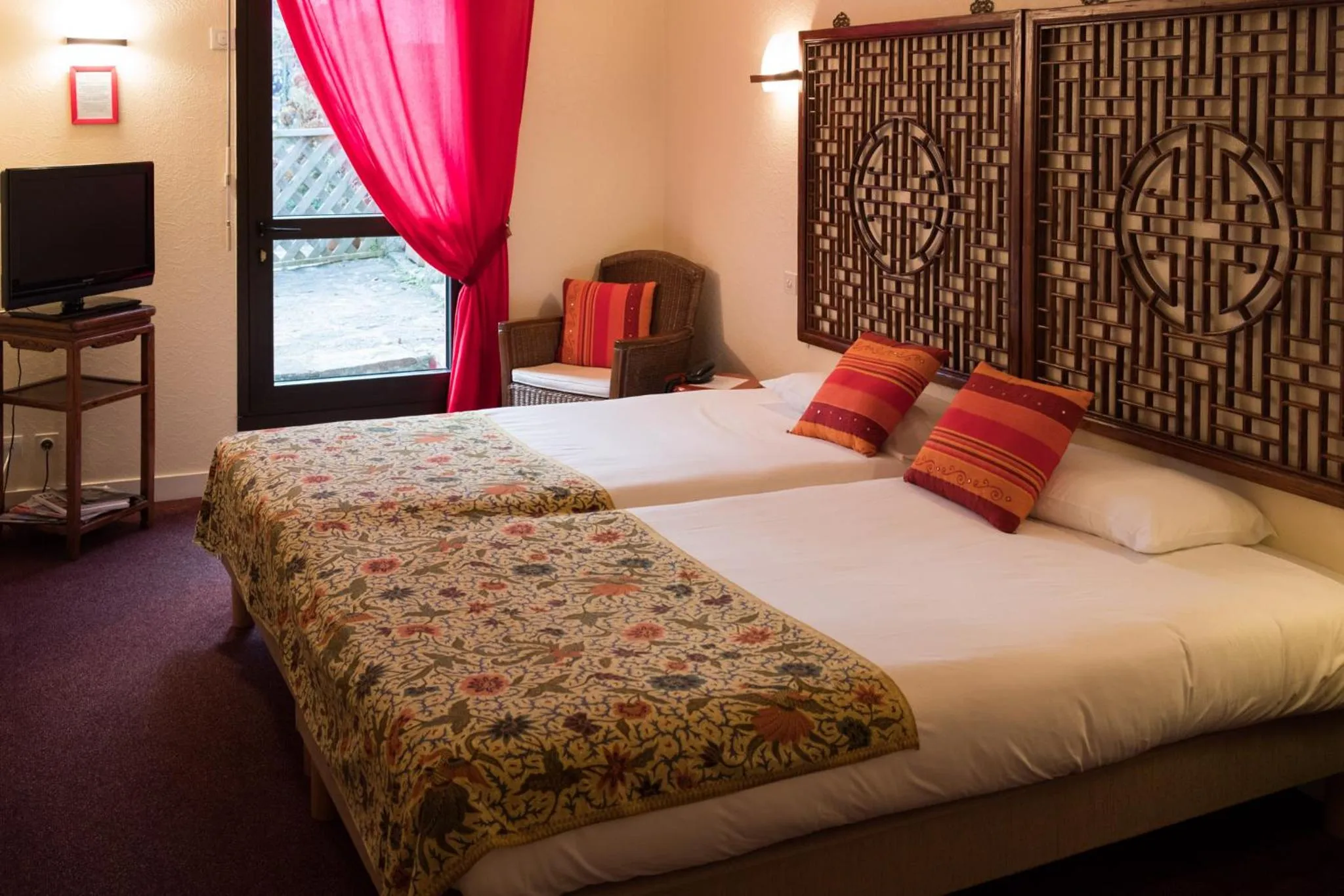 Bed in CITOTEL La Chaumière Roz-Aven