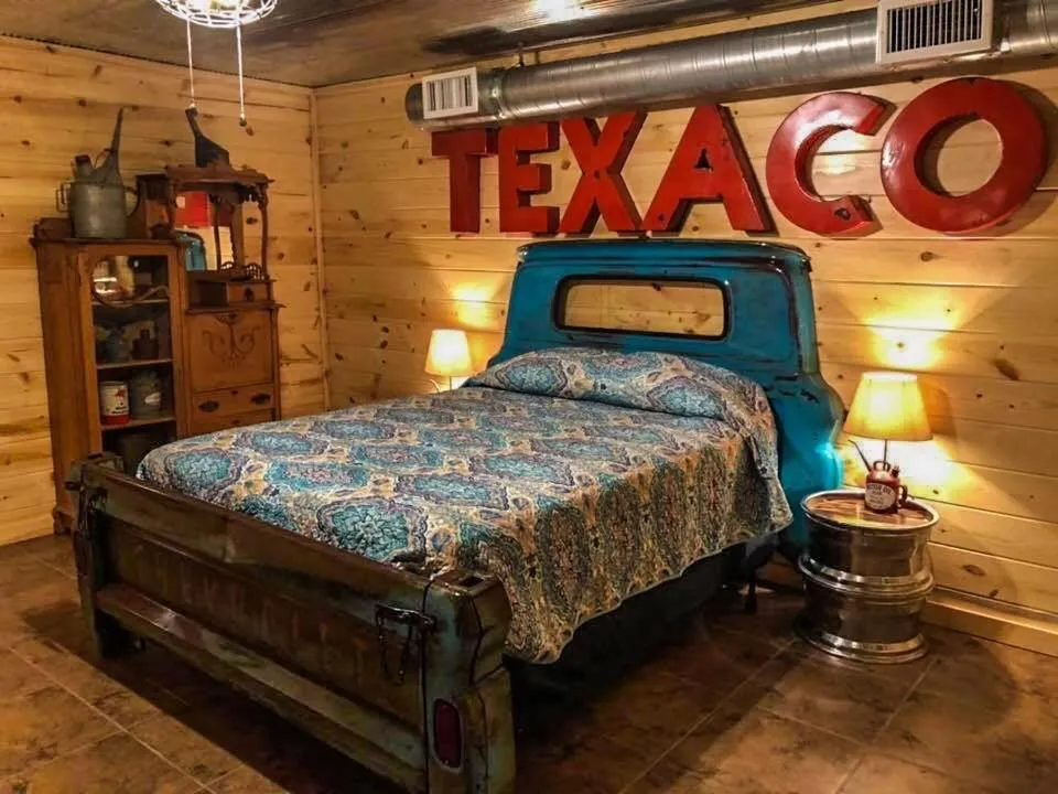 Bed in Samantha's Timber Inn