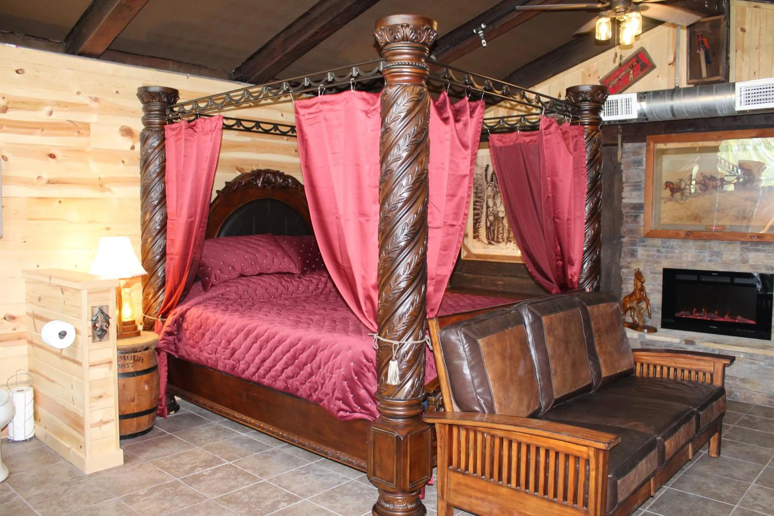 Bed in Samantha's Timber Inn