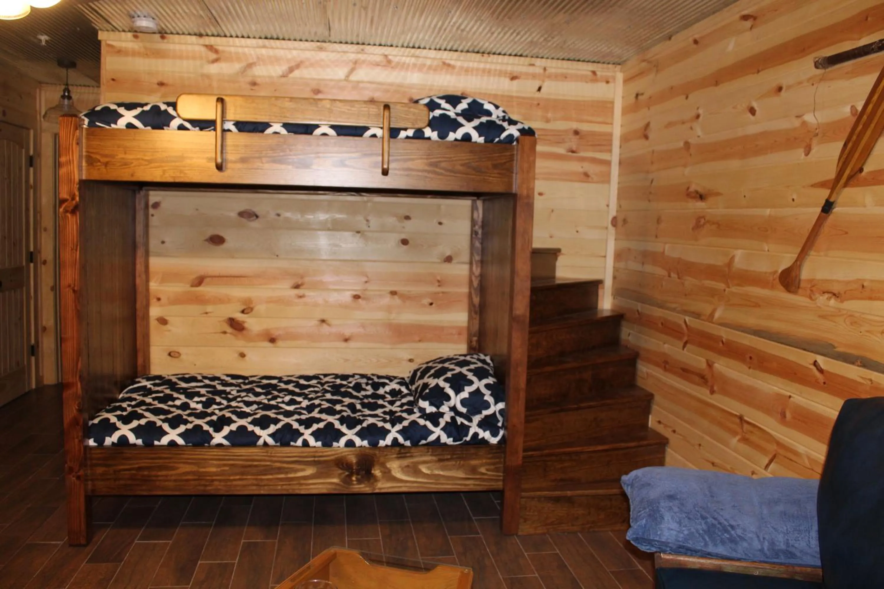 Bed in Samantha's Timber Inn