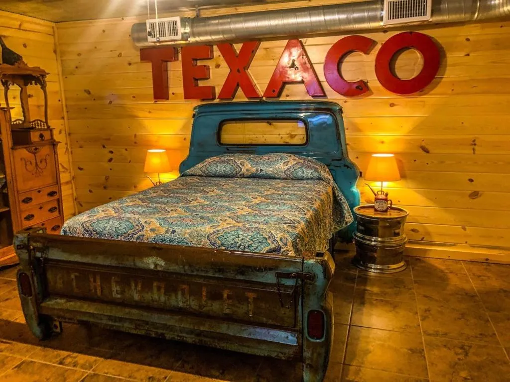 Bed in Samantha's Timber Inn