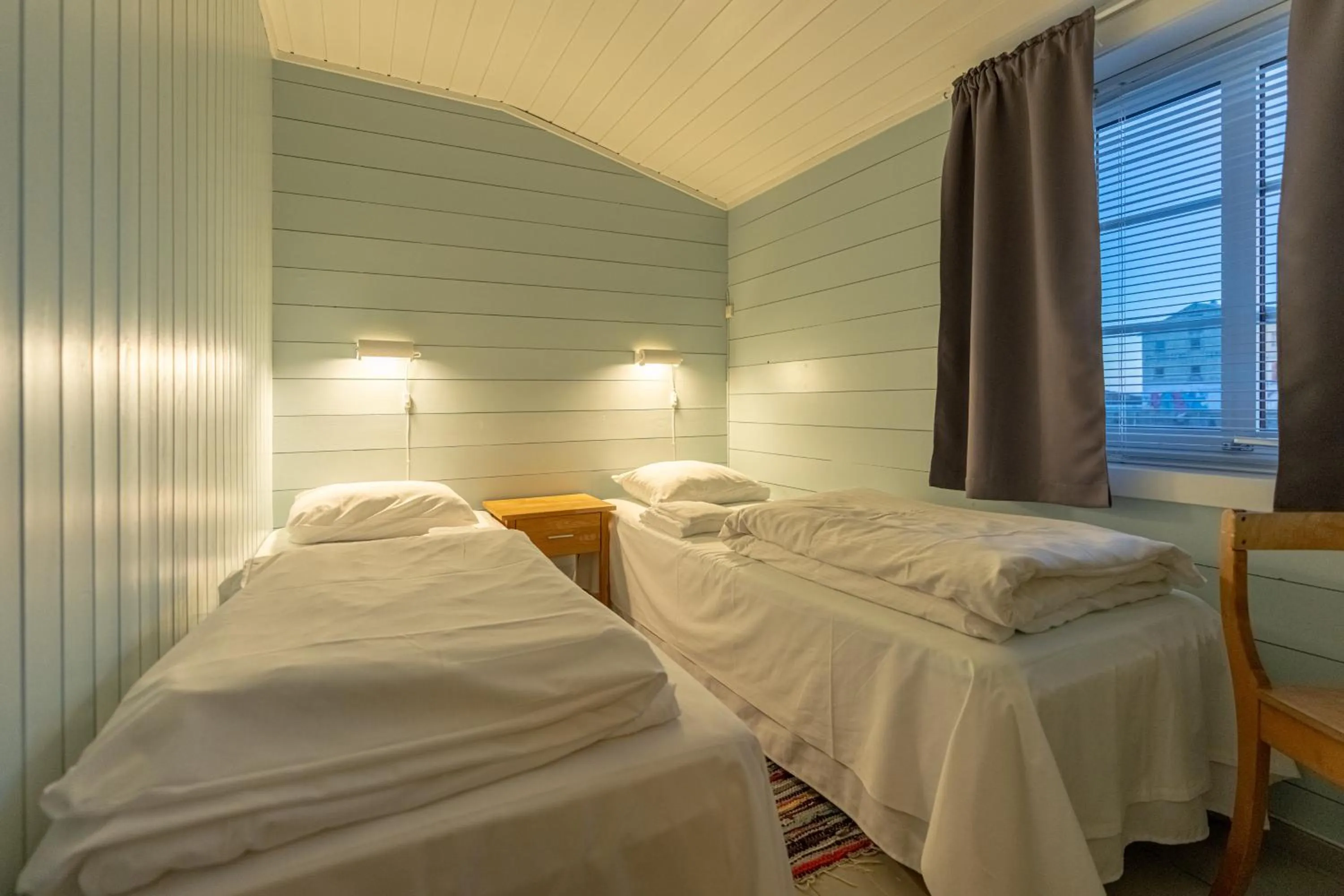 Bedroom, Bed in Henningsvær Rorbuer