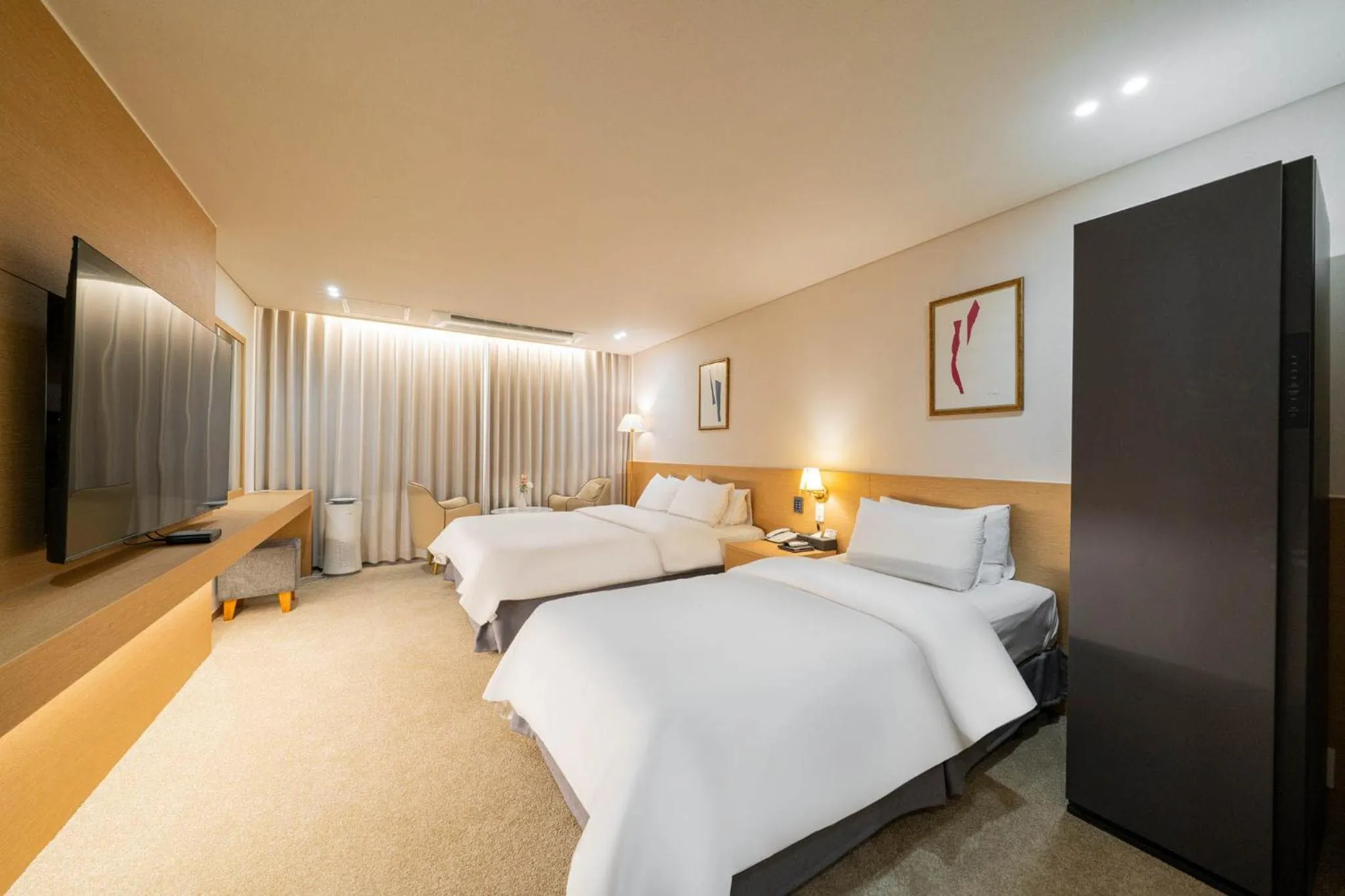 Bed in Benikea Hotel Bizinn