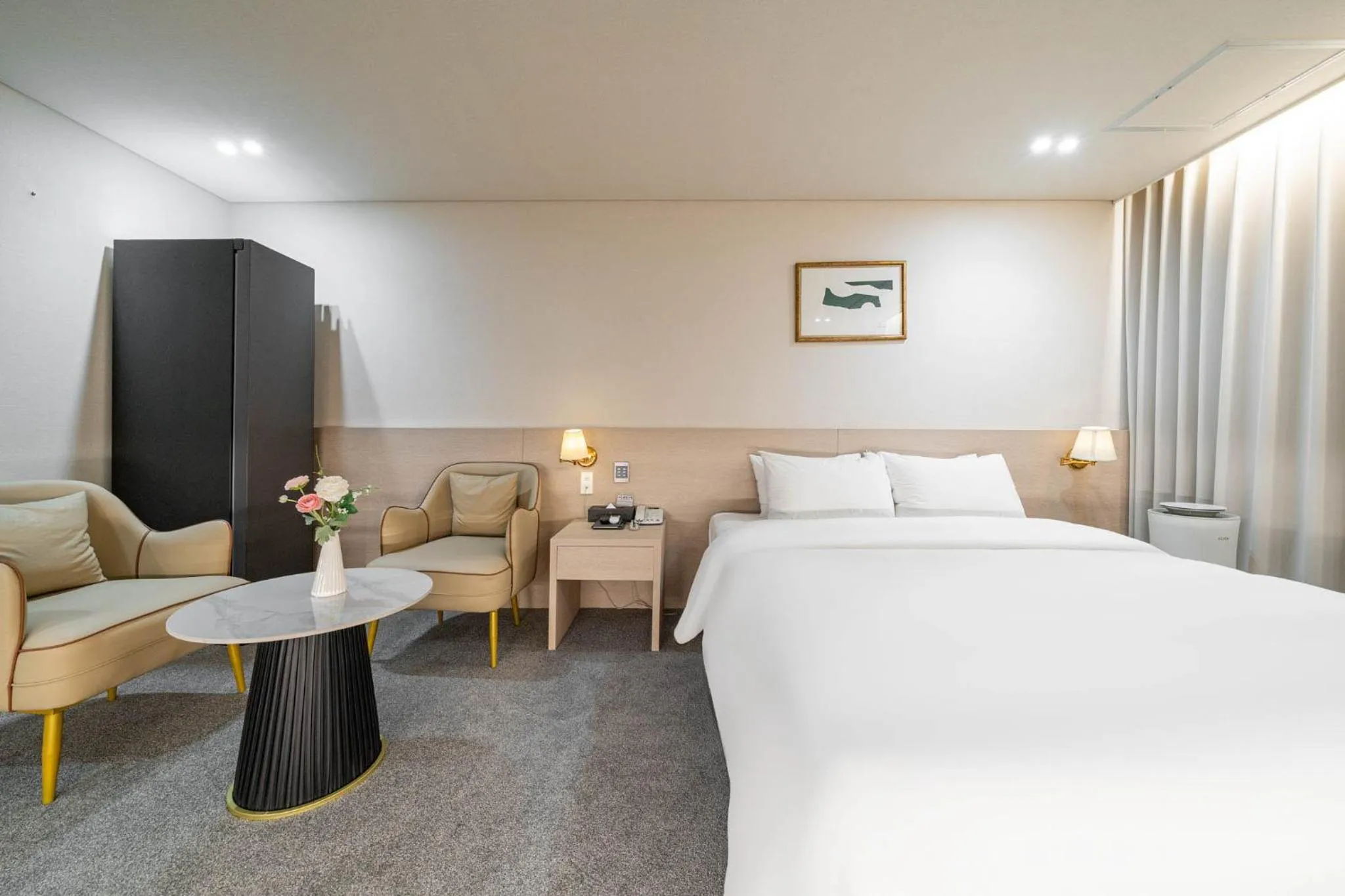 Bed in Benikea Hotel Bizinn