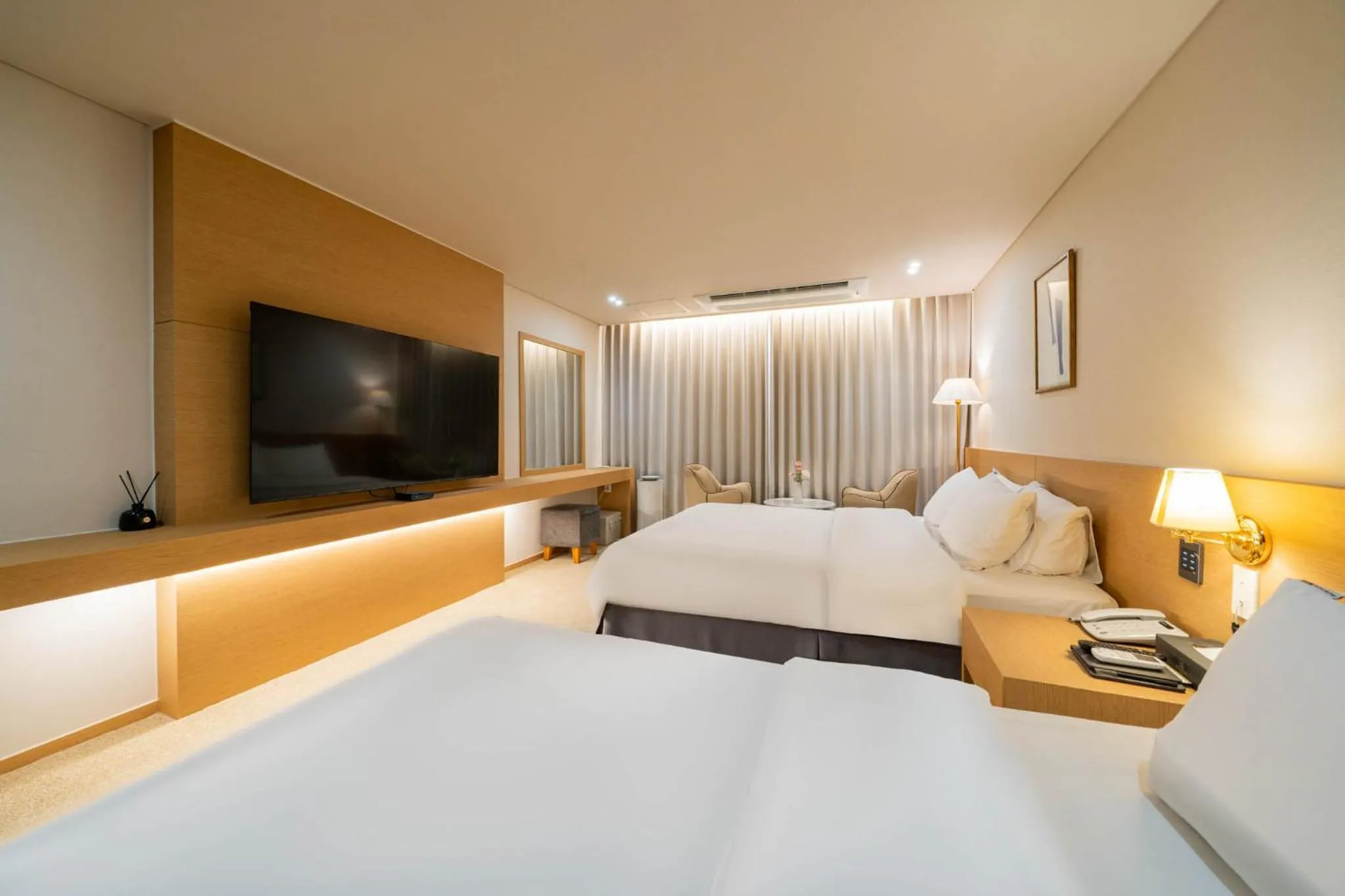 Bed in Benikea Hotel Bizinn