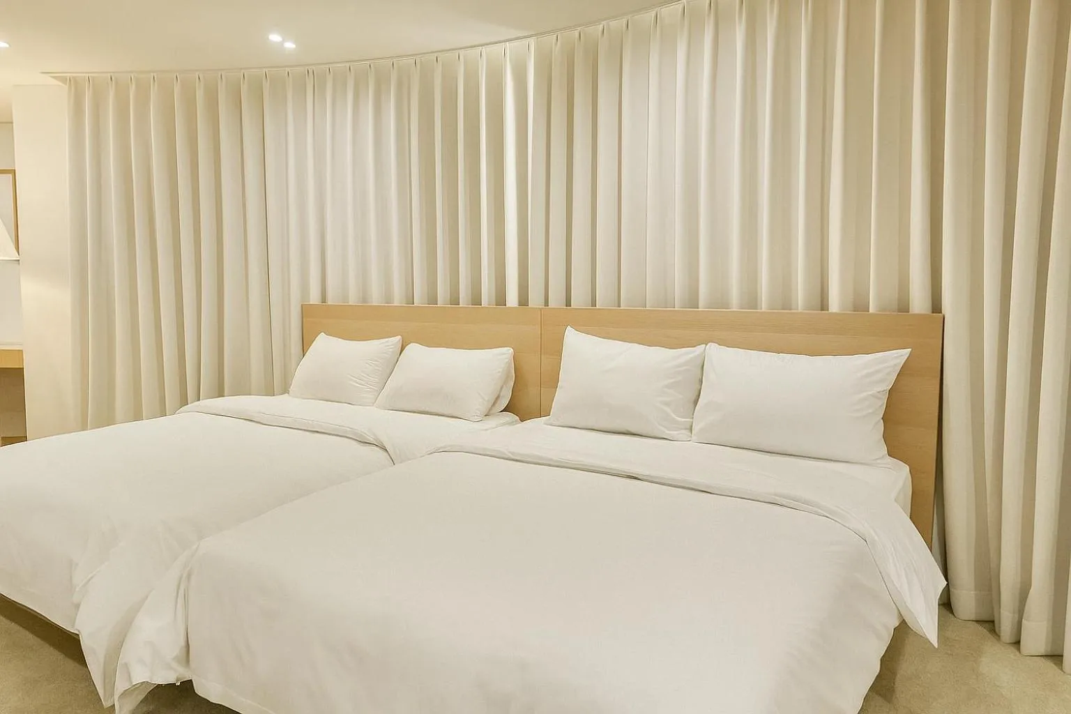 Bed in Benikea Hotel Bizinn