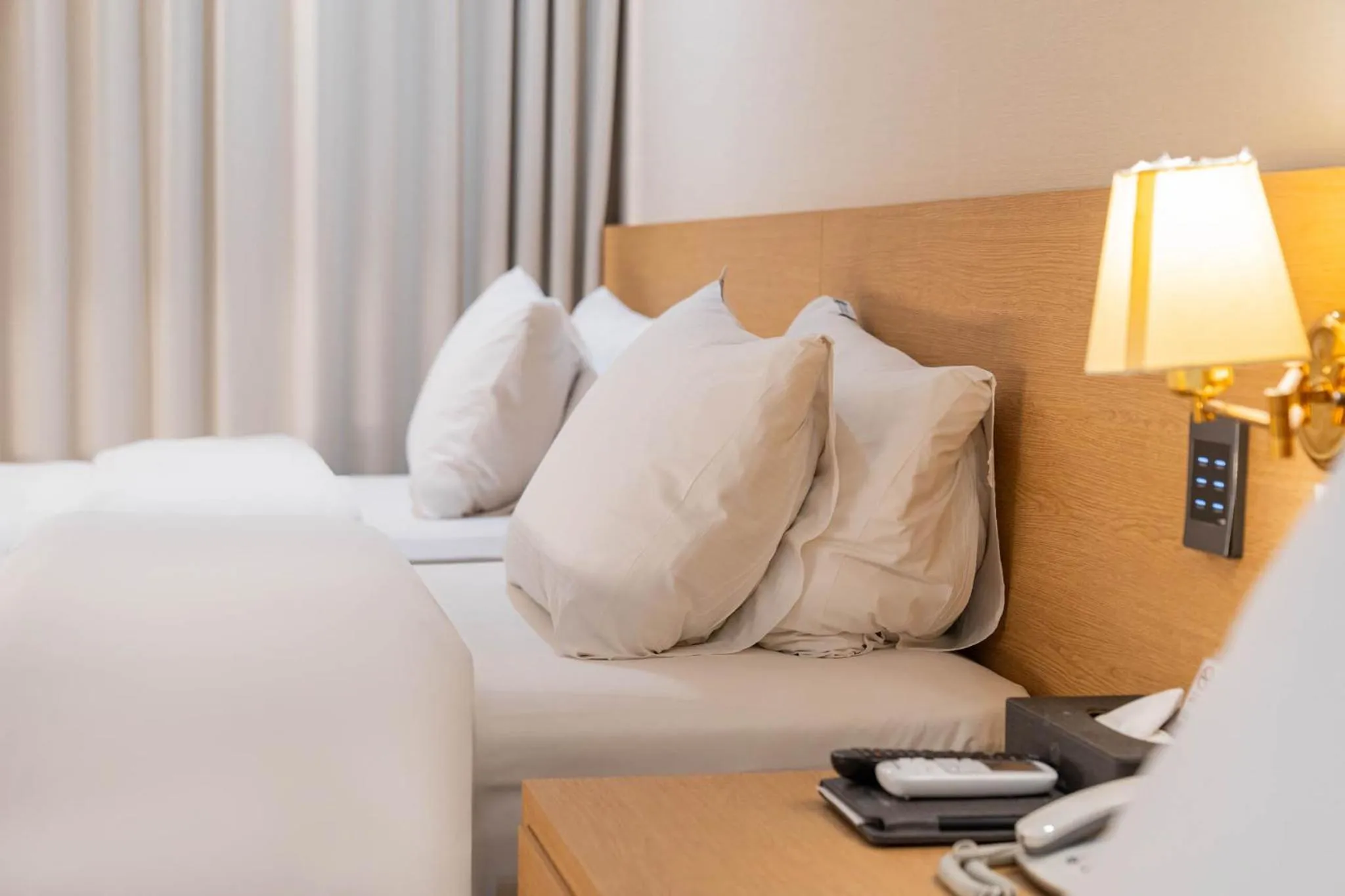 Bed in Benikea Hotel Bizinn