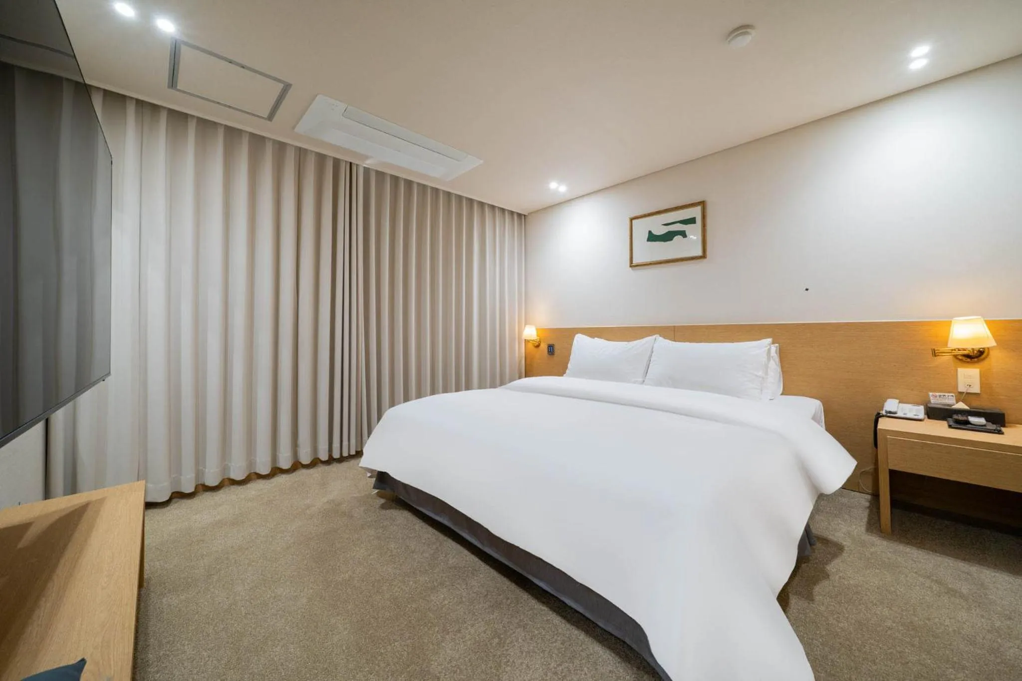 Bed in Benikea Hotel Bizinn