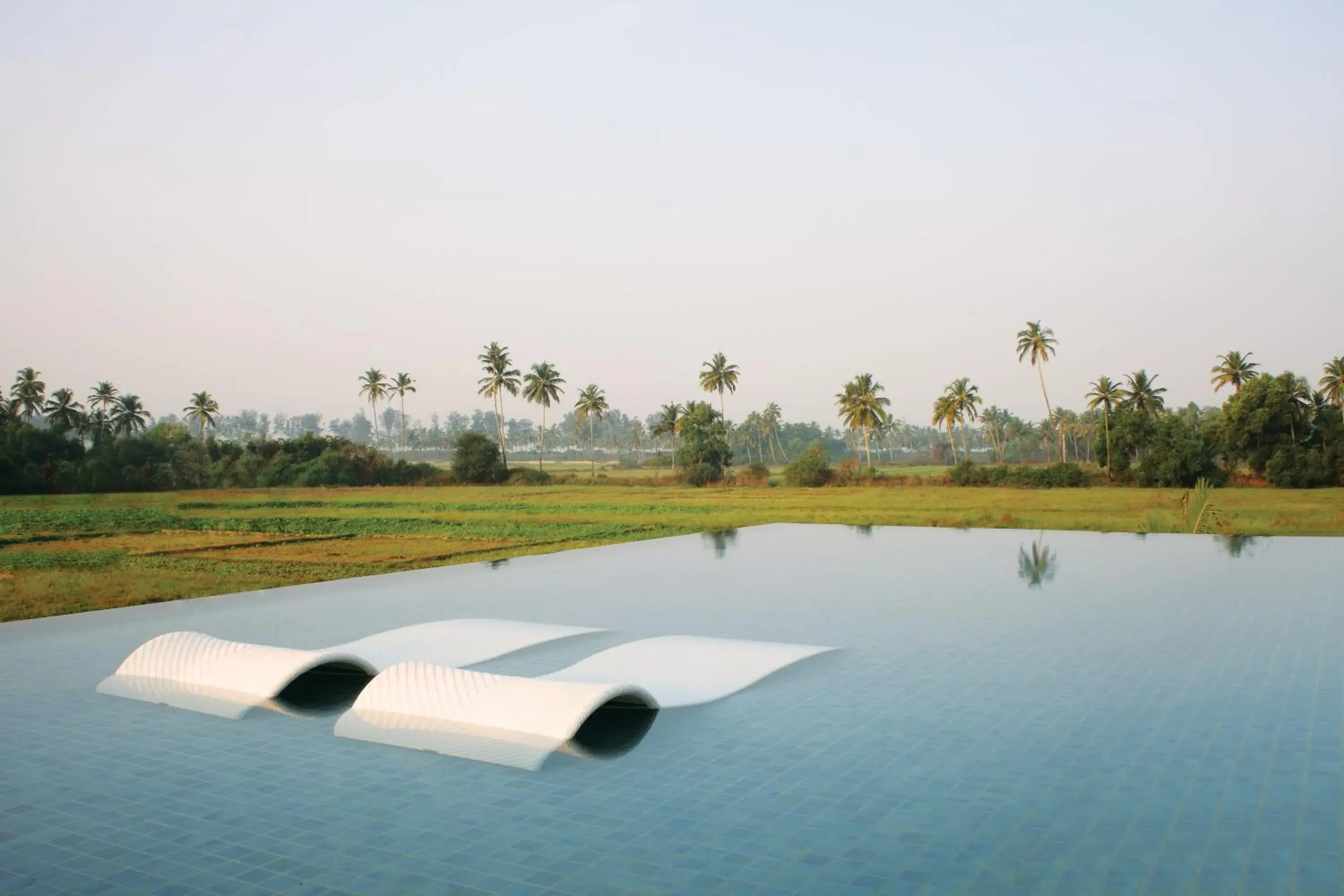 Swimming pool in Diwa Club by Alila - A Hyatt Brand Swimming pool in Diwa Club by Alila - A Hyatt Brand