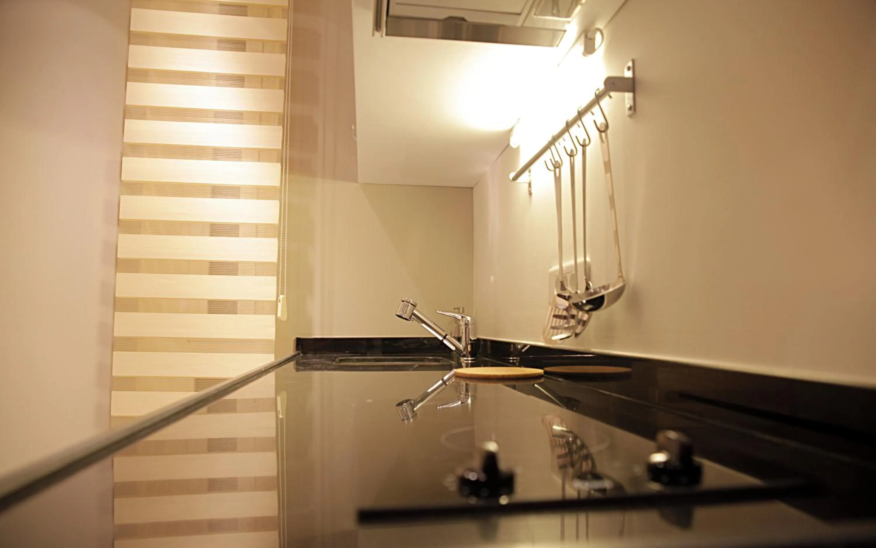 Kitchen or kitchenette in Frida Suites