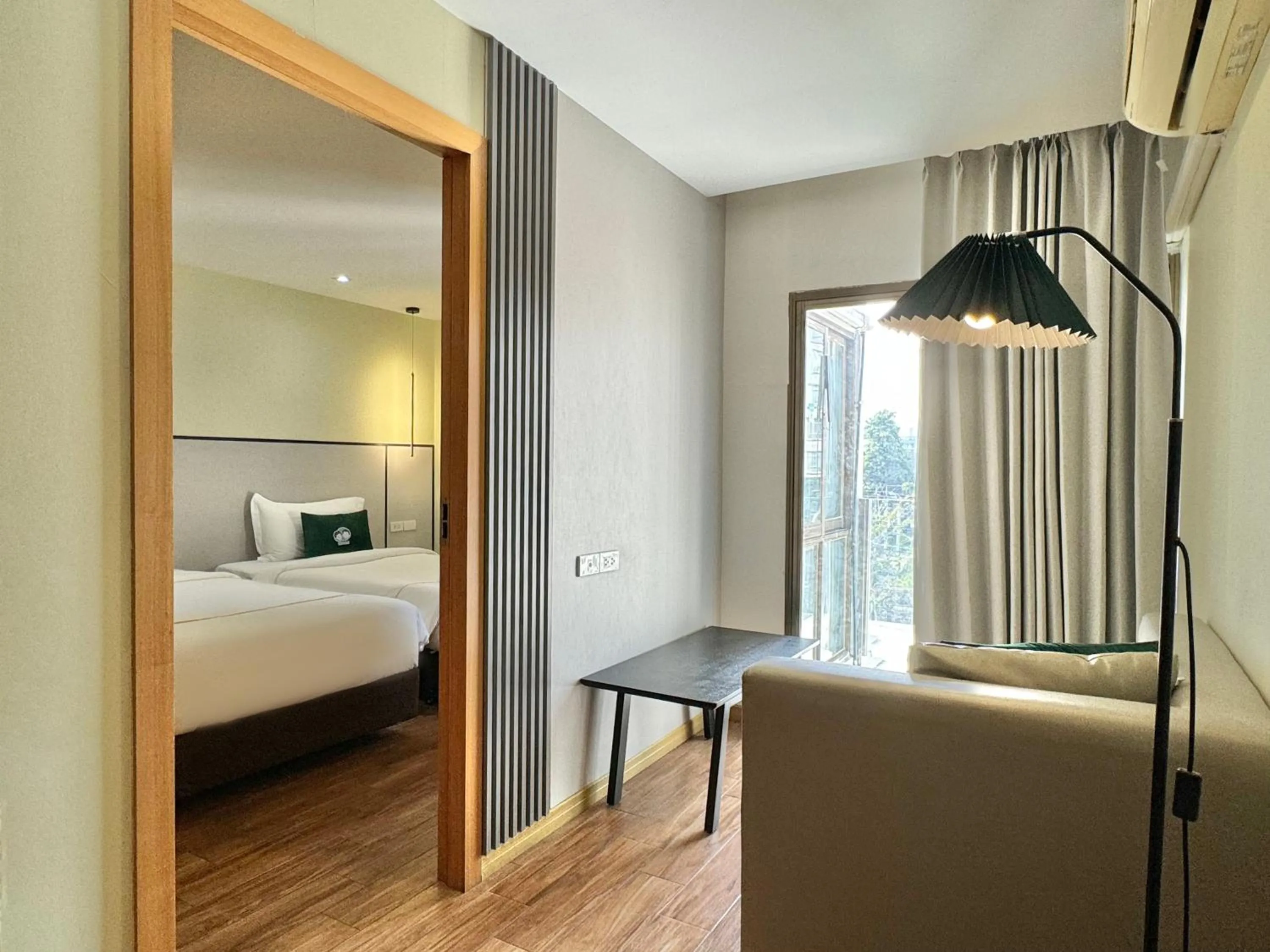 Living room, Bed in Pentafield City Residence