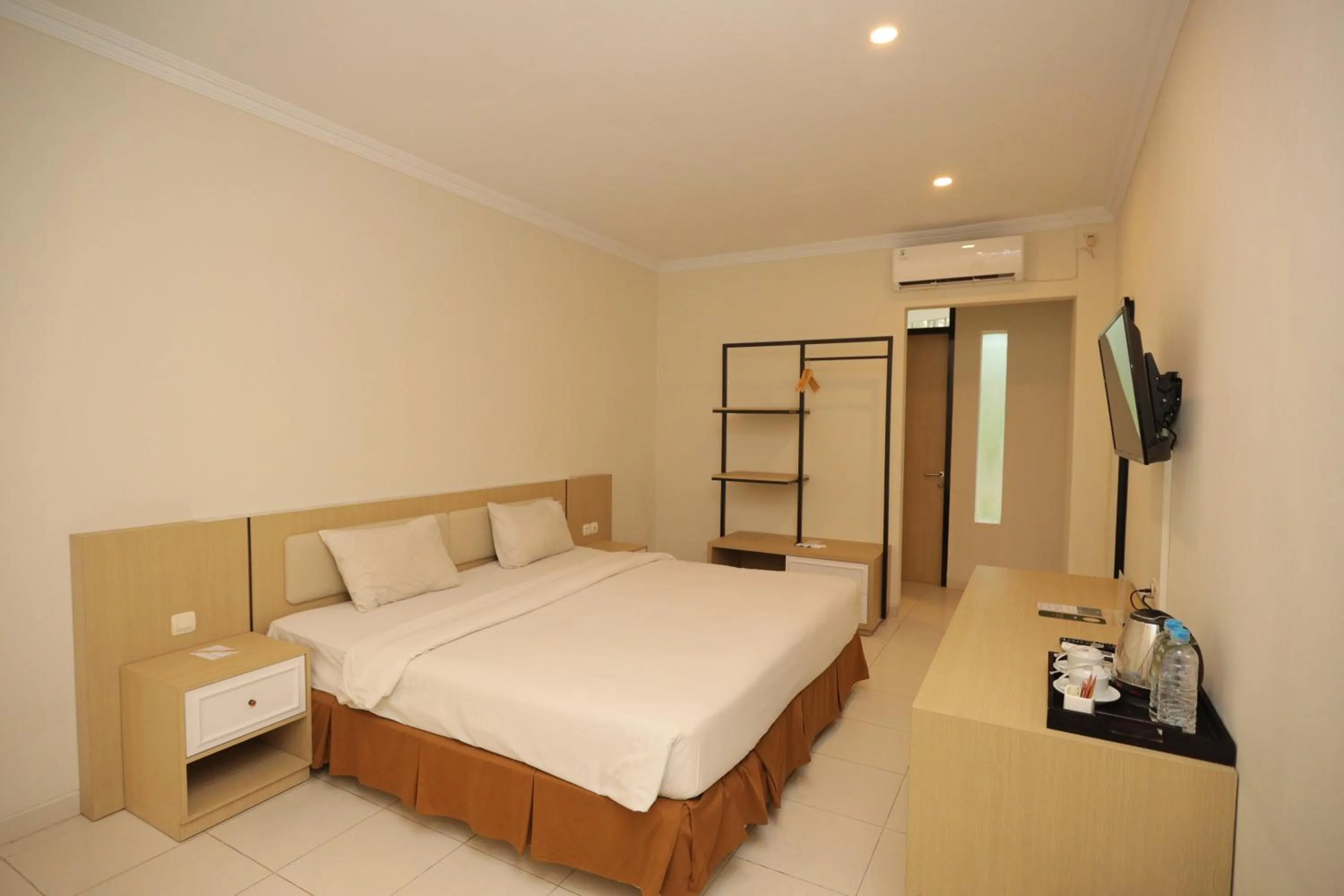 Bed in LPP Garden Hotel