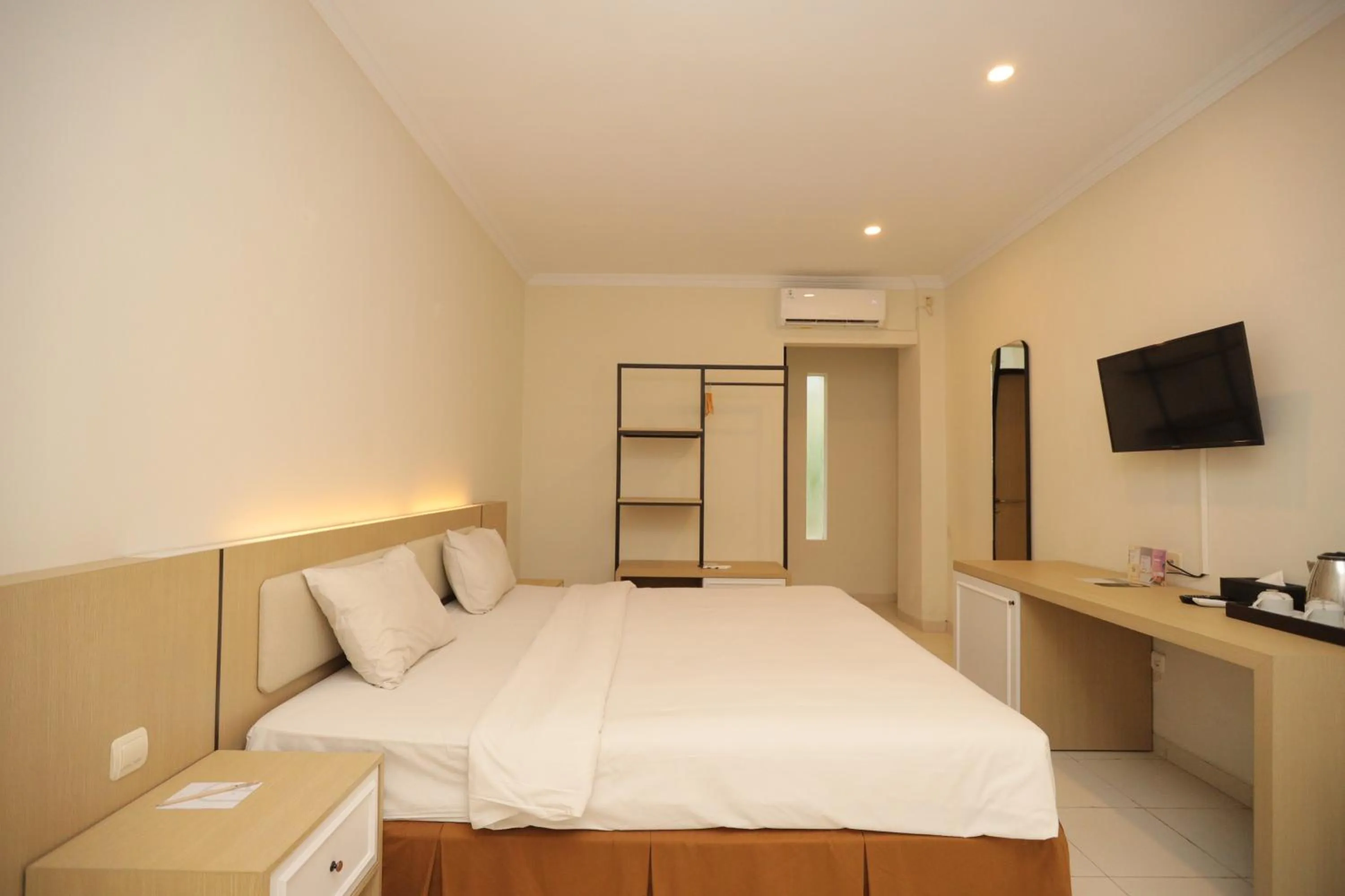 Bed in LPP Garden Hotel